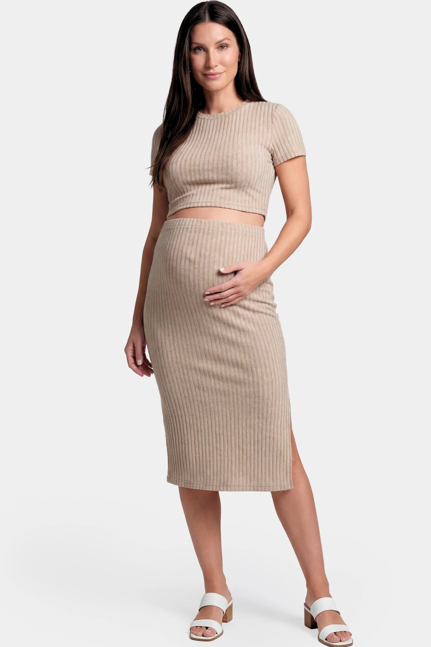 Ribbed Bodycon Crop Top & Skirt Maternity Set in beige featuring a fitted ribbed knit silhouette with side slit on a pregnant model.