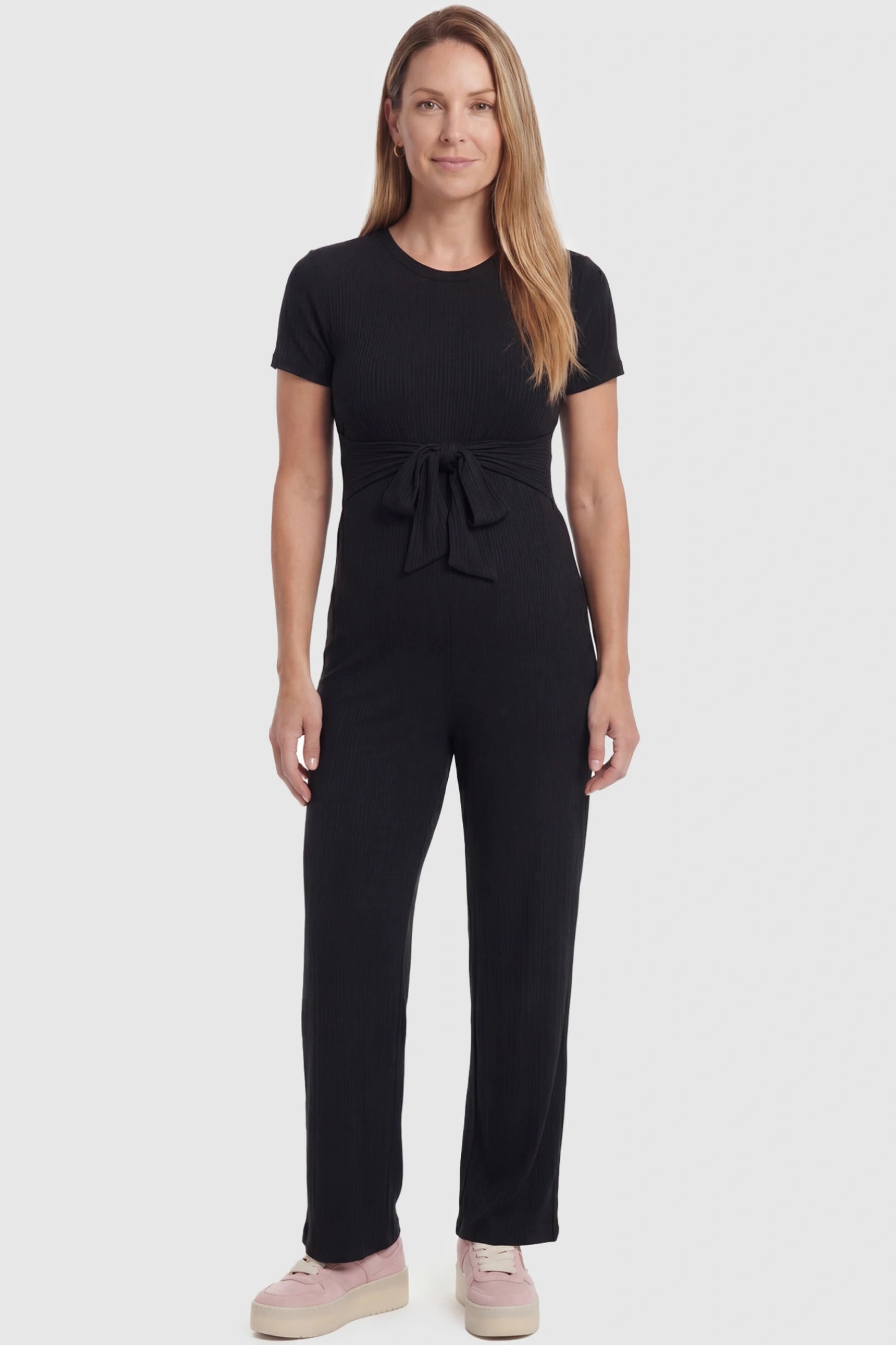 Round Neck Paperbag Waist Maternity Jumpsuit Round Neck Paperbag Waist Maternity Jumpsuit in Black featuring a tie waist on a postpartum model, front view.