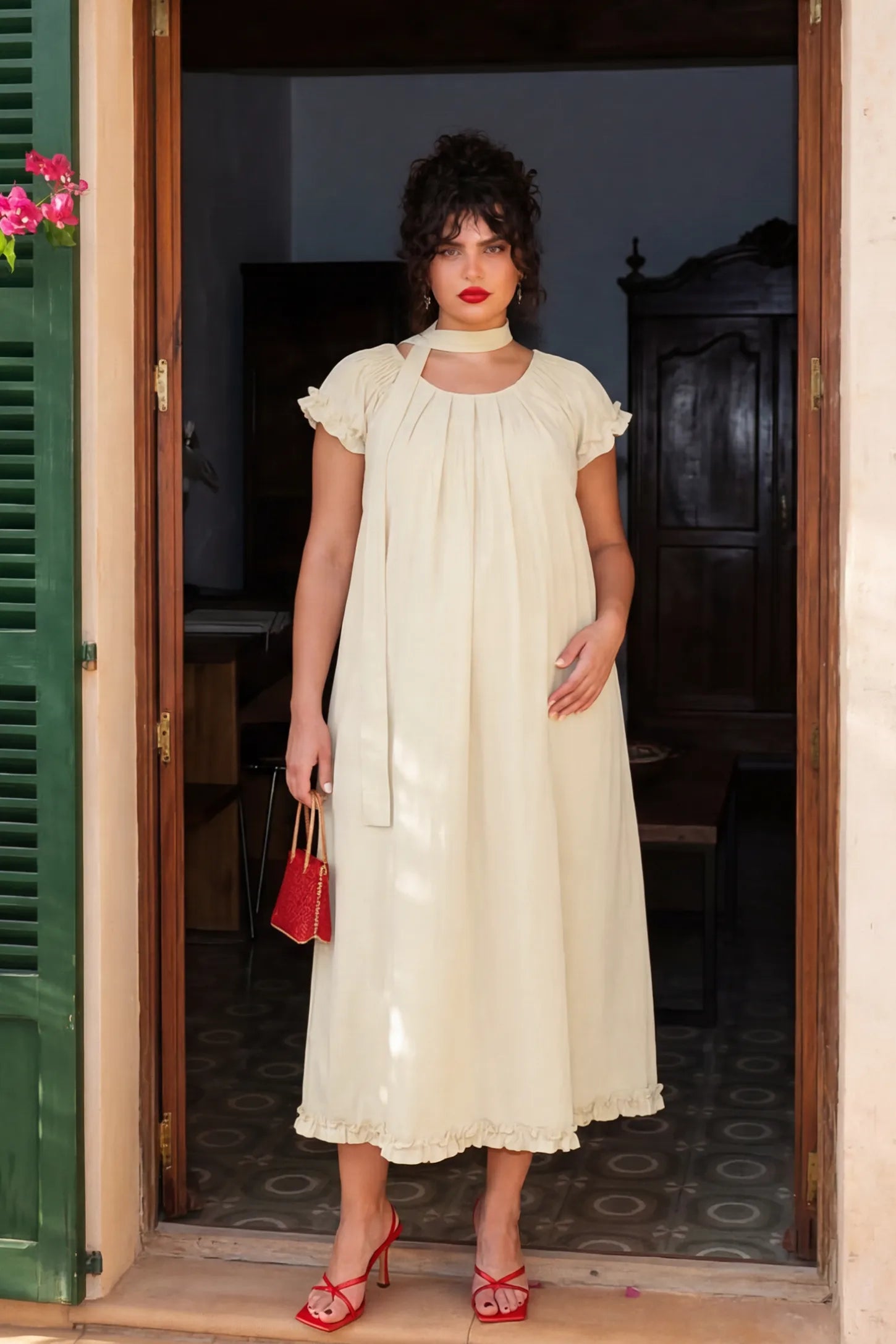 Round Neck Short Sleeve Maternity Midi Dress with Pockets Round neck short sleeve maternity midi dress with pockets in beige with round neckline and tie neck detail, front view on pregnant model