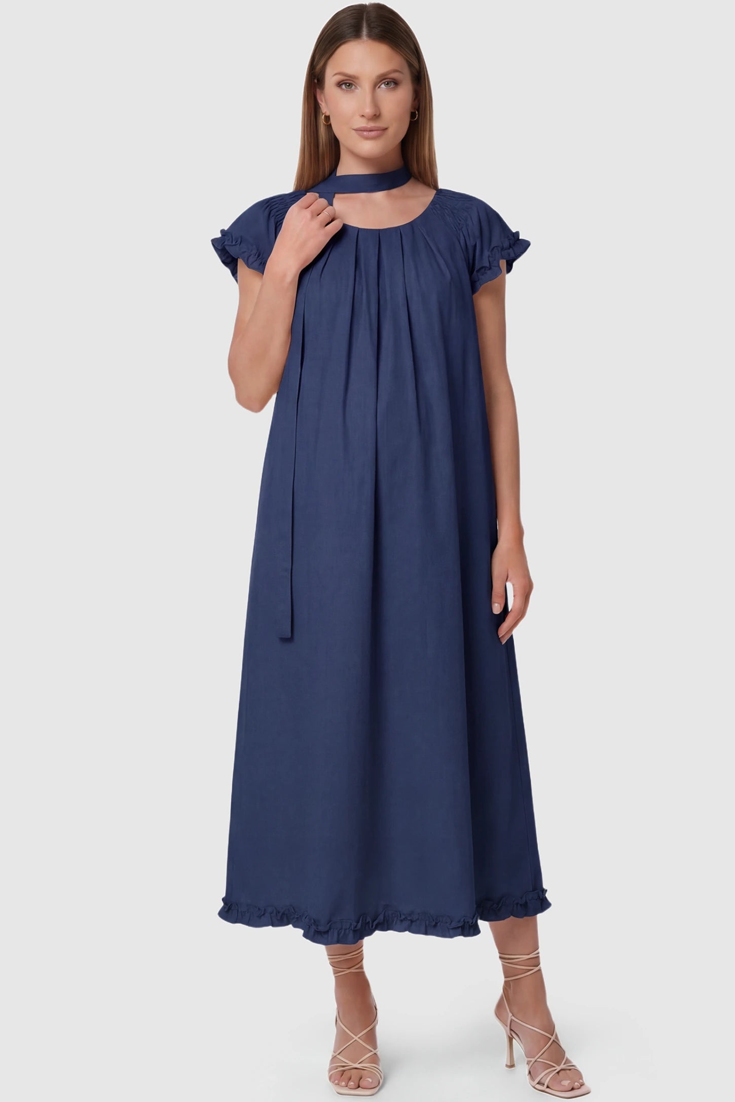 Round Neck Short Sleeve Maternity Midi Dress with Pockets Round neck short sleeve maternity midi dress with pockets in blue with round neckline and tie neck detail, front view on pregnant model