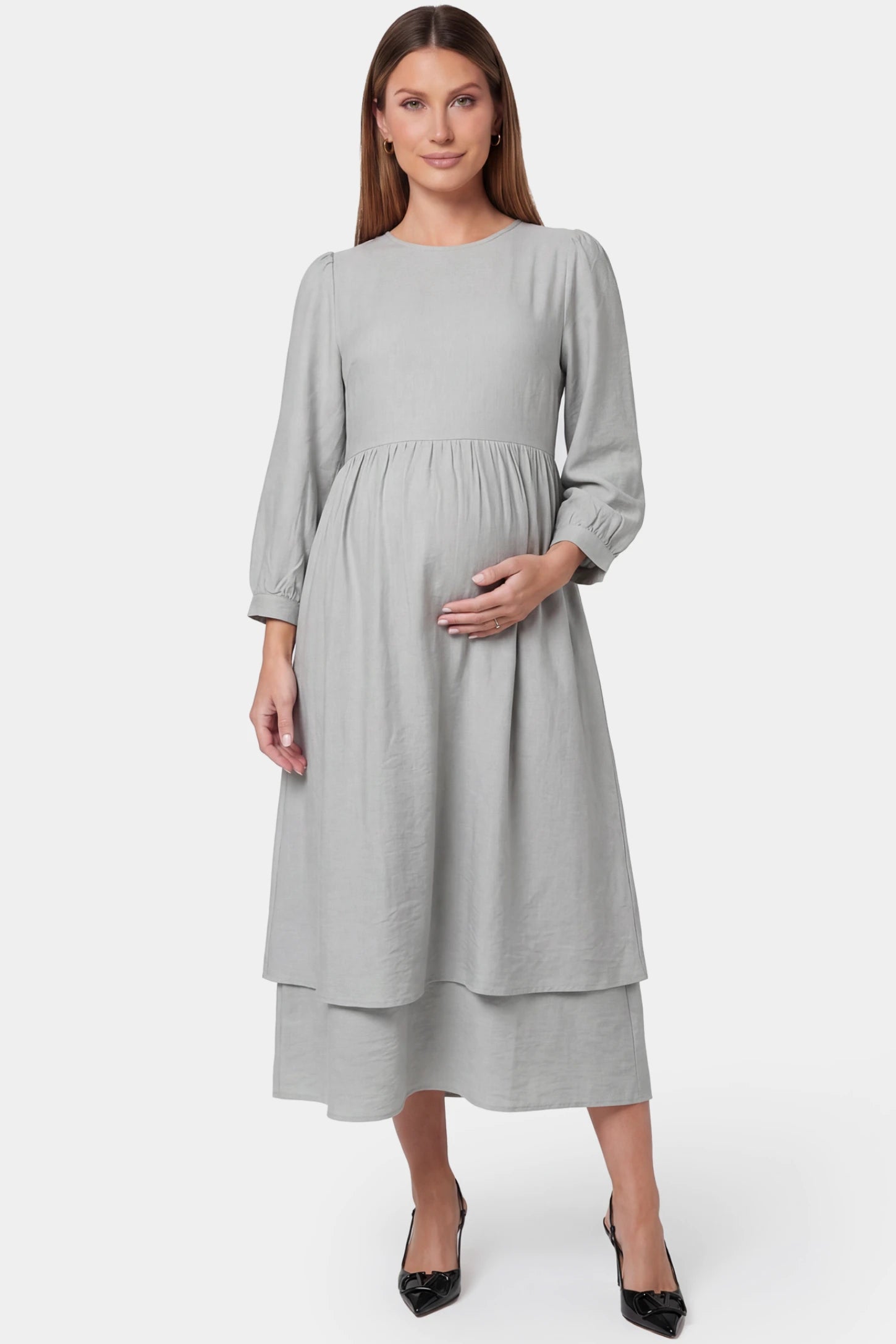 Round neck A-line midi maternity dress in gray featuring round neckline in front view on a pregnant model
