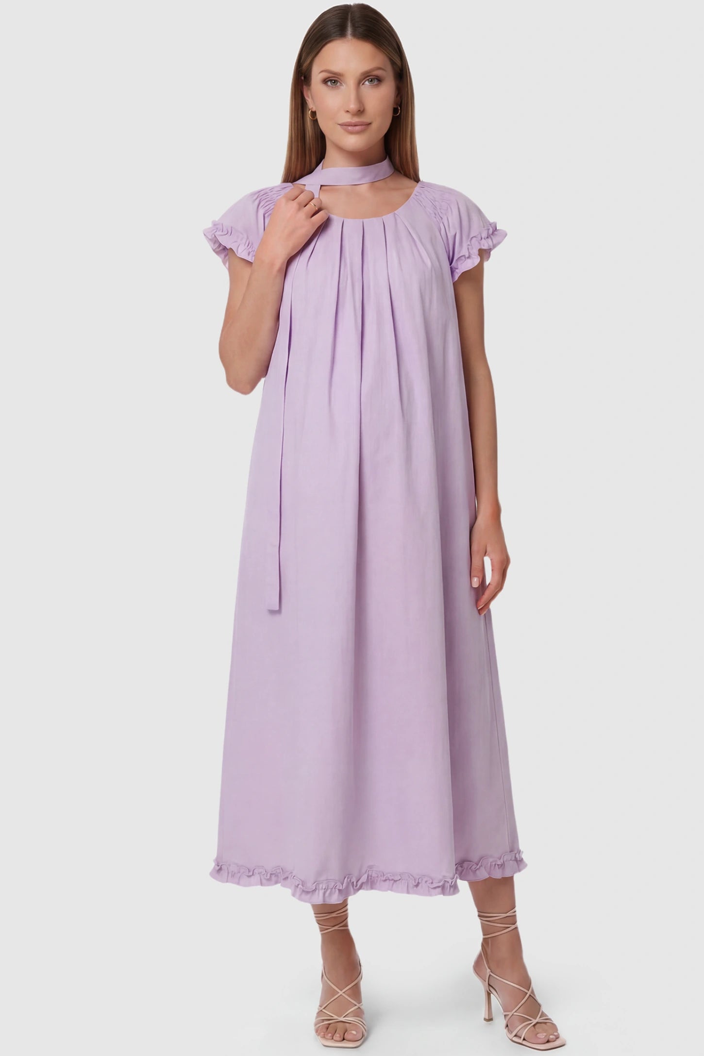 Round Neck Short Sleeve Maternity Midi Dress with Pockets Round neck short sleeve maternity midi dress with pockets in purple with round neckline and tie neck detail, front view on pregnant model
