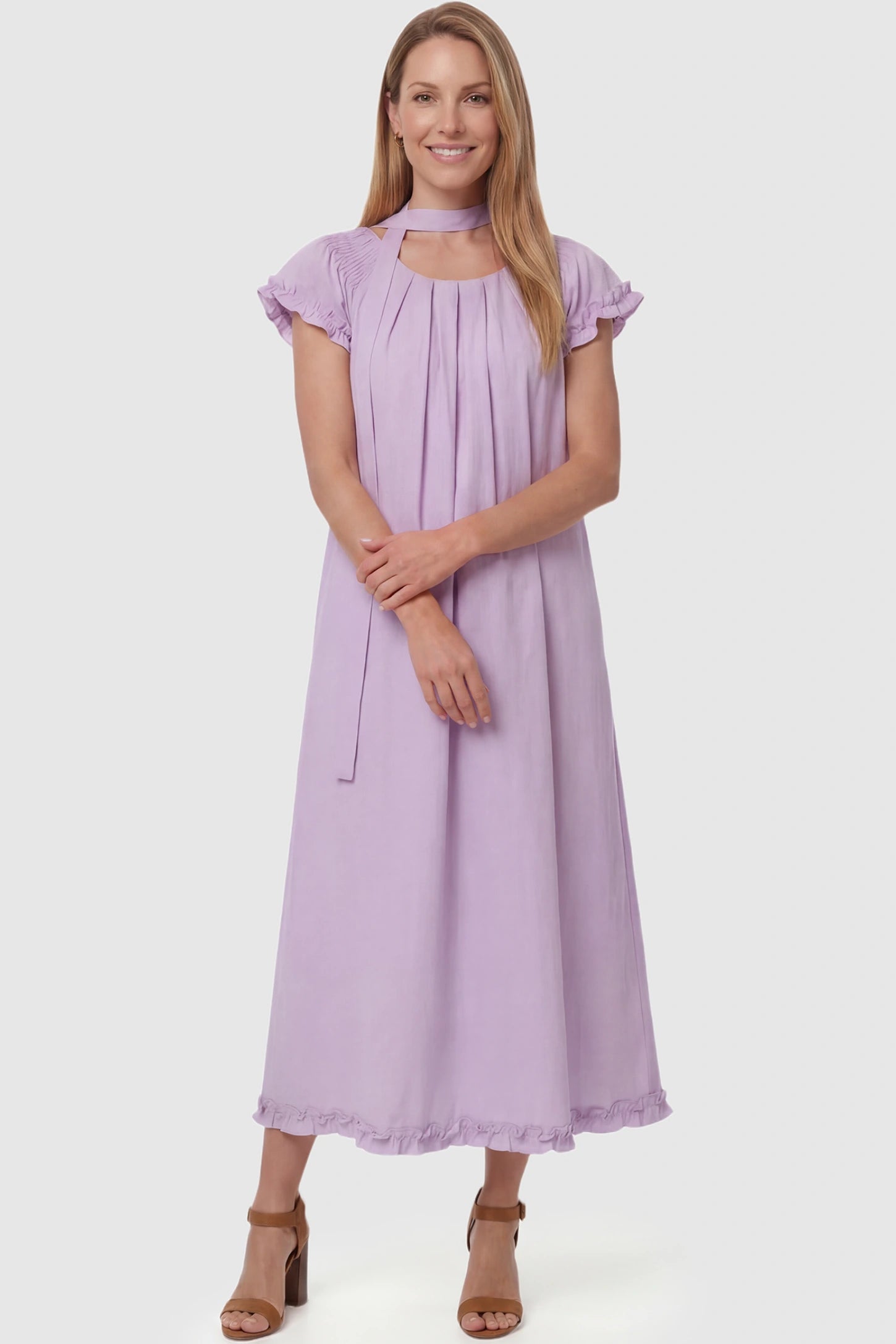 Round Neck Short Sleeve Maternity Midi Dress with Pockets Round neck short sleeve maternity midi dress with pockets in purple with round neckline and tie neck detail, front view on postpartum model