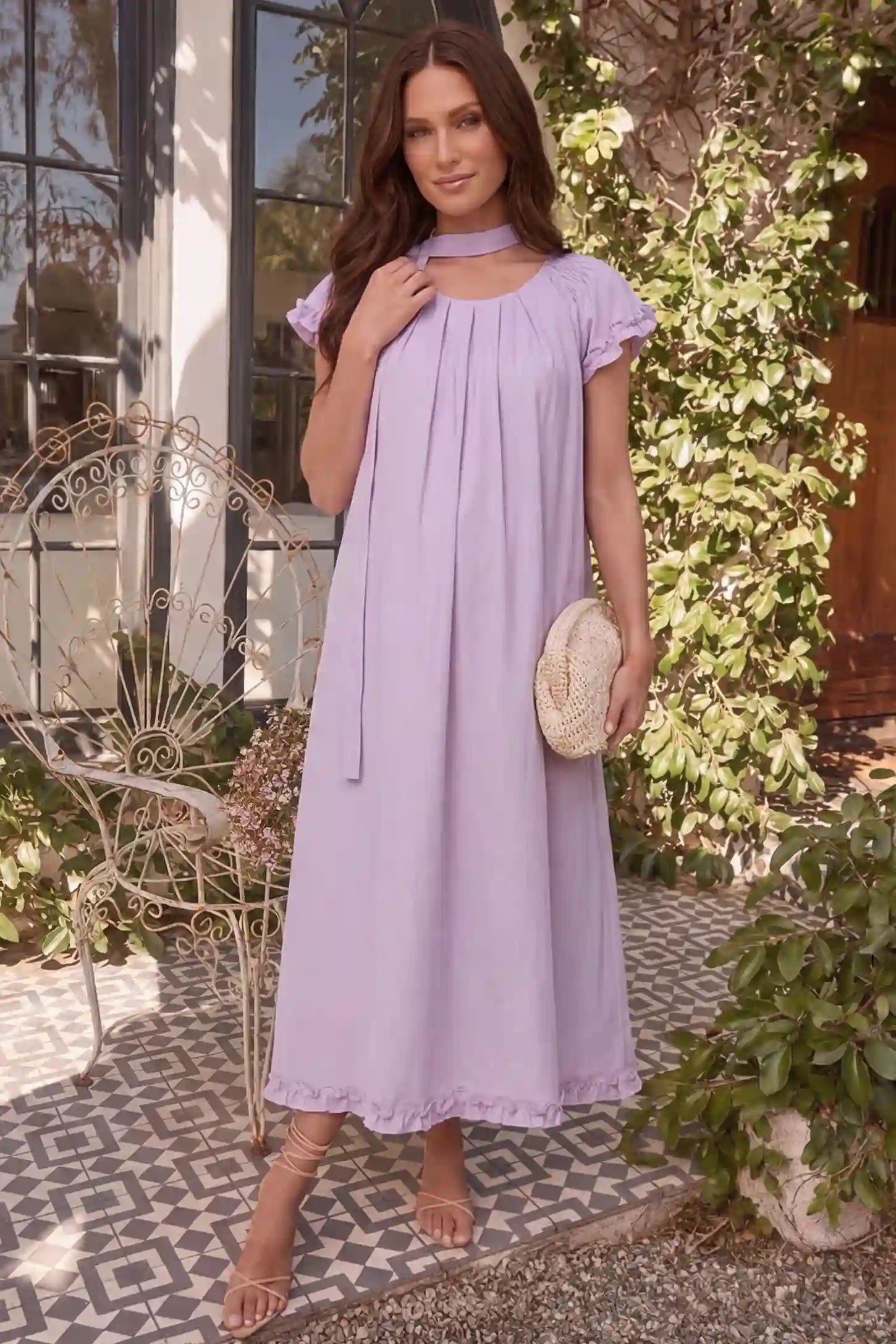 Round Neck Short Sleeve Maternity Midi Dress with Pockets Round neck short sleeve maternity midi dress with pockets in purple with round neckline and tie neck detail, front view on pregnant model
