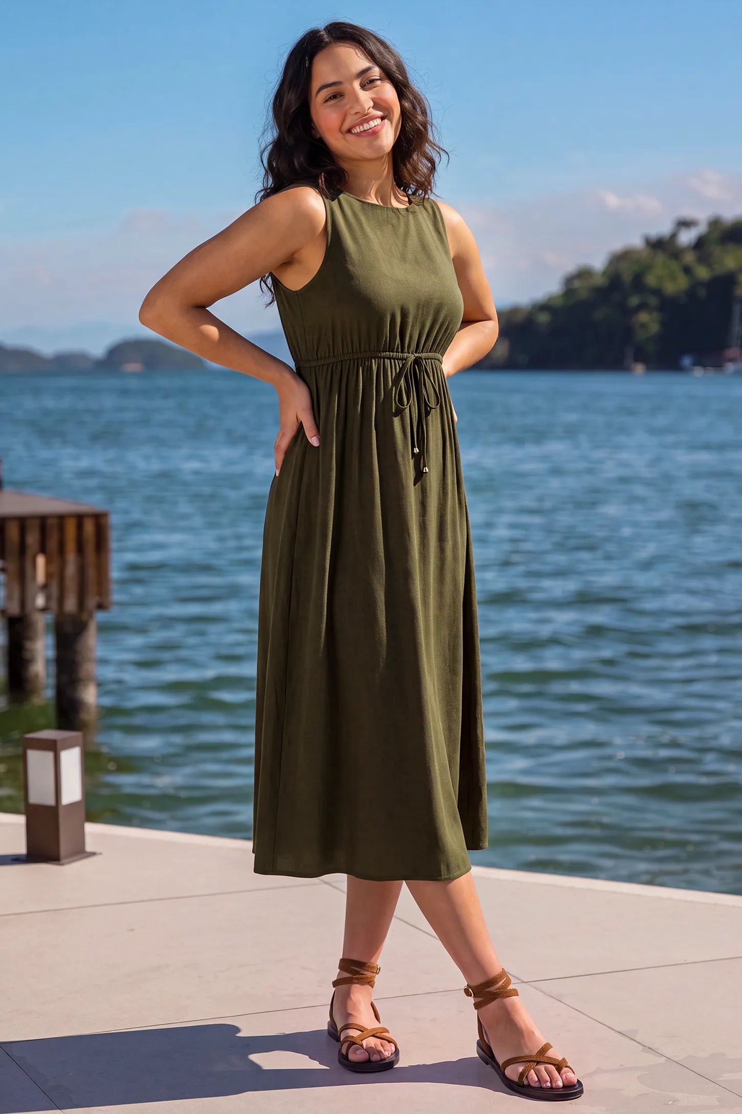 Drawstring Waist Sleeveless Full Skirt Maternity Skater Dress Drawstring Waist Sleeveless Maternity Skater Dress in Army Green featuring a cinched drawstring on a postpartum model.