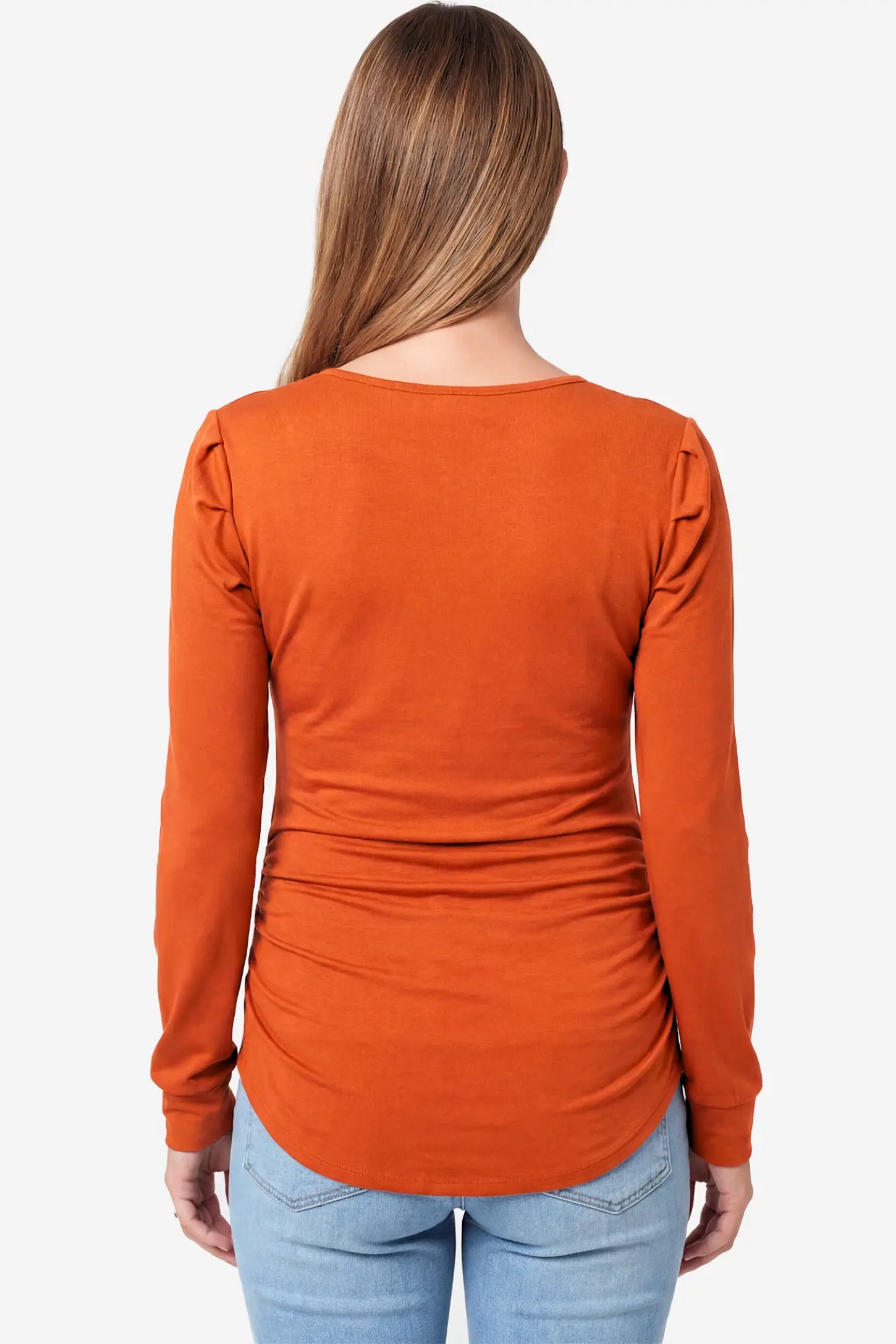 Ribbed Puff Sleeve Maternity Top Ribbed Puff Sleeve Maternity Top in orange featuring a round neckline and gentle ruching on a pregnant model.