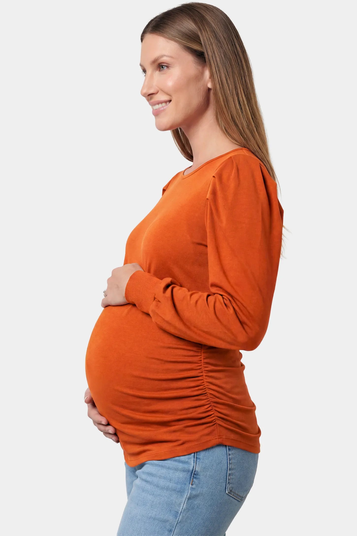 Ribbed Puff Sleeve Maternity Top in orange featuring a round neckline and gentle ruching on a pregnant model.