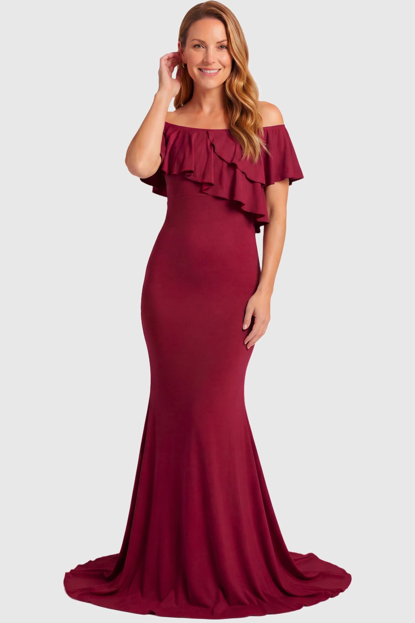 Off-Shoulder Mermaid Maternity Gown Off-Shoulder Mermaid Maternity Gown in light wine red featuring ruffle overlay, flounce neckline, and sweep train on a non pregnant model.