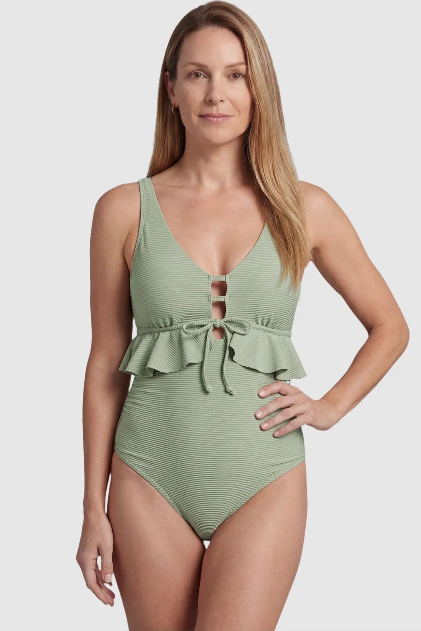 Ruffle Trim Halter Neck Maternity Swimsuit Ruffle Trim Halter Neck Maternity Swimsuit in Mint Green featuring a supportive fitted silhouette on a non-pregnant model.