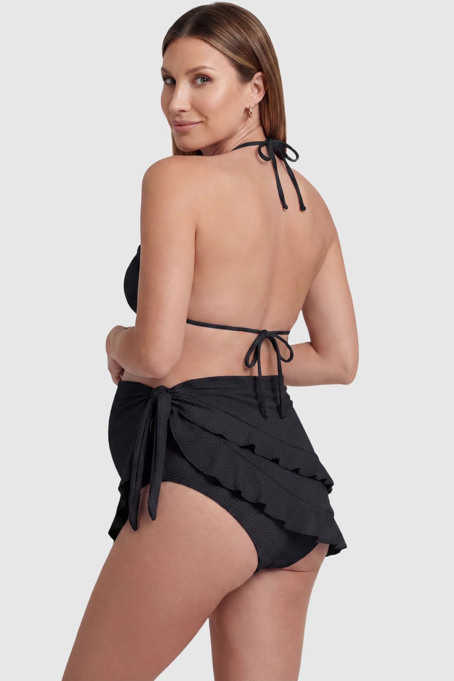Ruffled Trim Halter Maternity Bikini Set Ruffled trim halter maternity bikini set in black with adjustable halter straps, back view on pregnant model