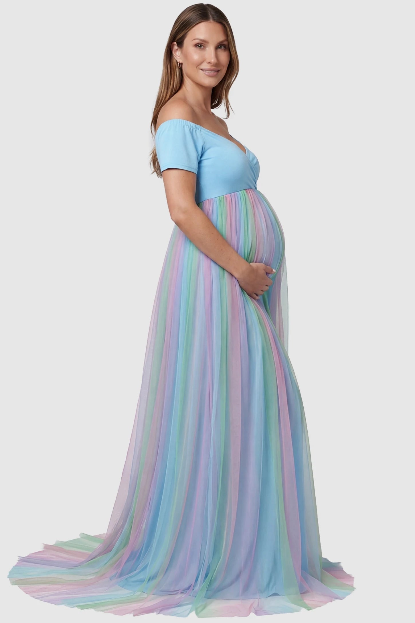 Ruffled Tulle Off-Shoulder Maternity Photoshoot Dress Sky Blue maternity photoshoot dress featuring a layered tulle trailing skirt on a side-profile pregnant model.
