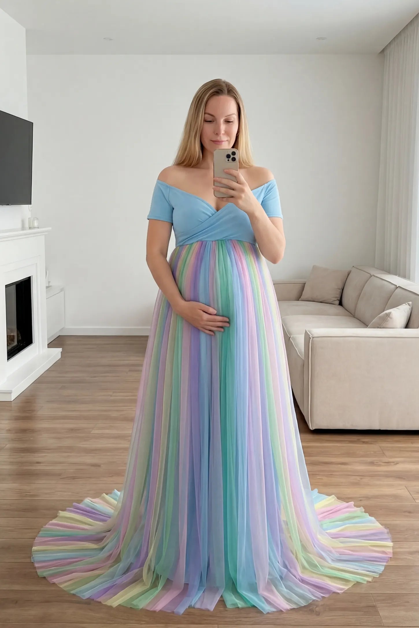 Ruffled Tulle Off-Shoulder Maternity Photoshoot Dress Ruffled Tulle Off-Shoulder Maternity Photoshoot Dress in Sky Blue showing the ruffled trailing skirt on a pregnant model in front view.