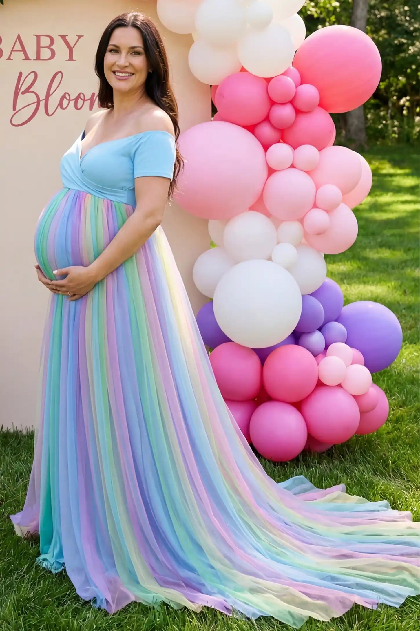 Ruffled Tulle Off-Shoulder Maternity Photoshoot Dress Ruffled Tulle Off-Shoulder Maternity Photoshoot Dress in Sky Blue showing the ruffled trailing skirt on a pregnant model.