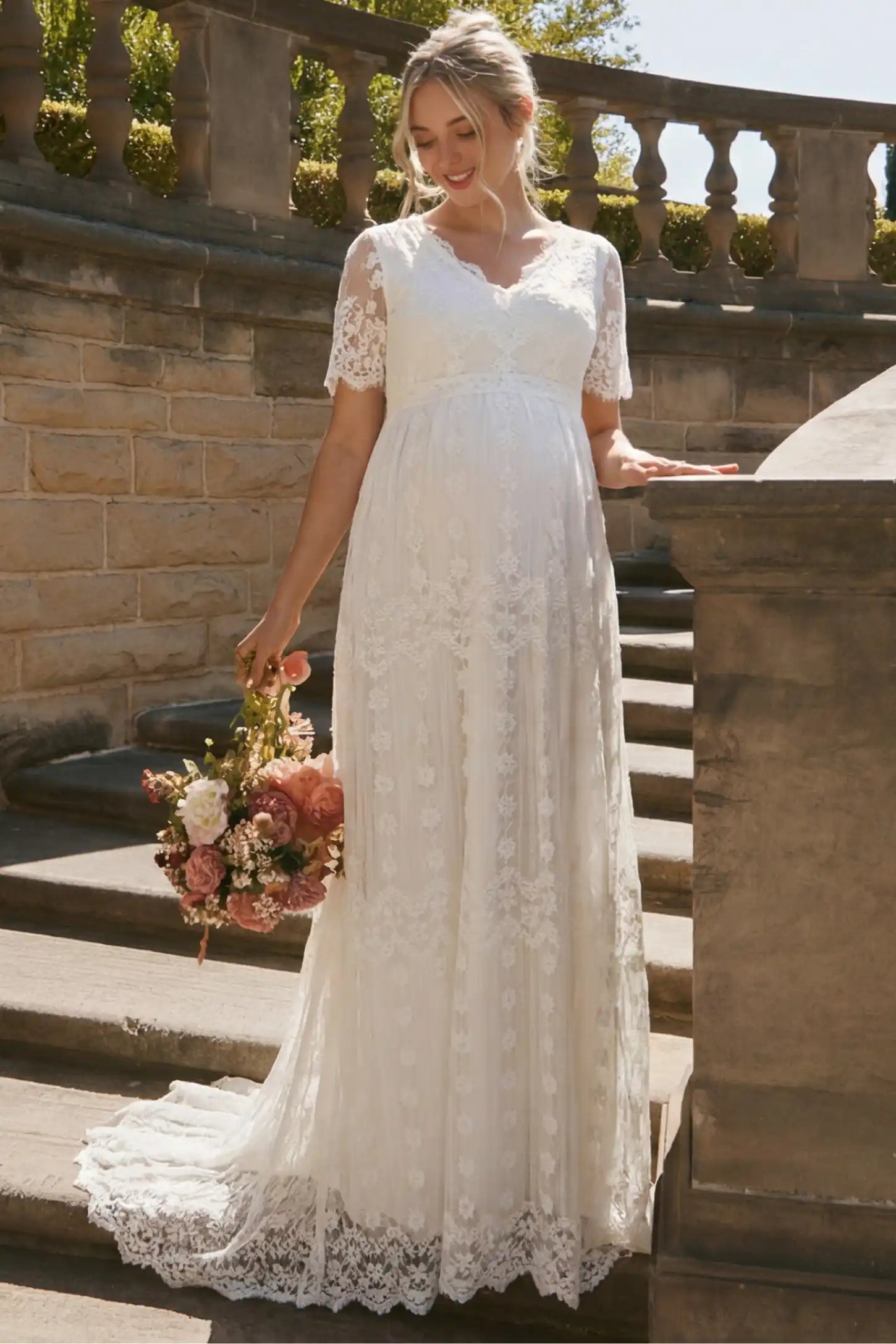 Lace Scalloped V-Neck Maternity Gown in white featuring short lace sleeves and scalloped hem on pregnant model.