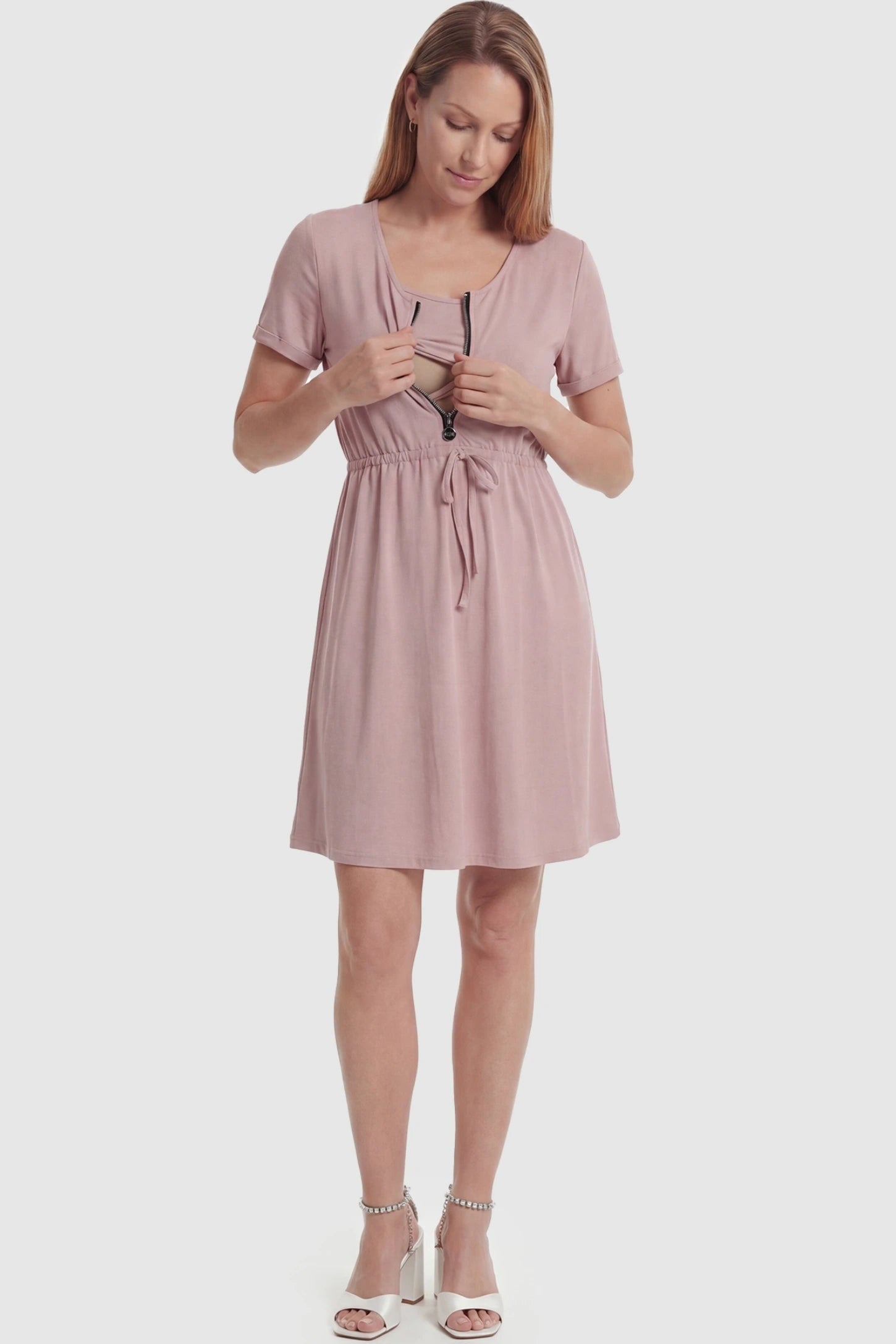 Scoop Neck Short Sleeve Maternity & Nursing Dress Scoop neck short sleeve maternity and nursing dress in rose gold featuring breastfeeding-friendly design in full body view on a postpartum model