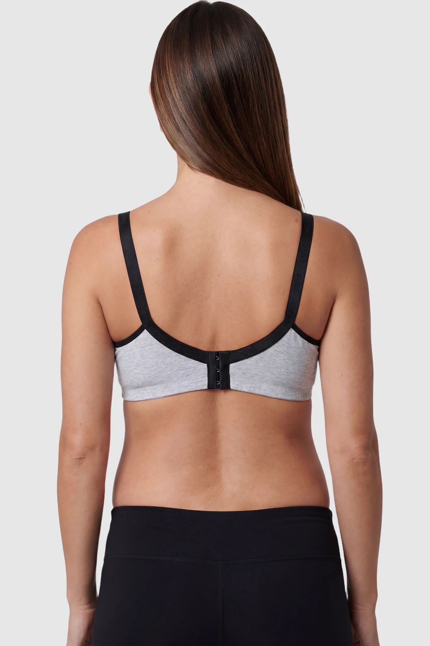 Clip-Down Seamless Nursing Bra in gray featuring adjustable straps on pregnant model.
