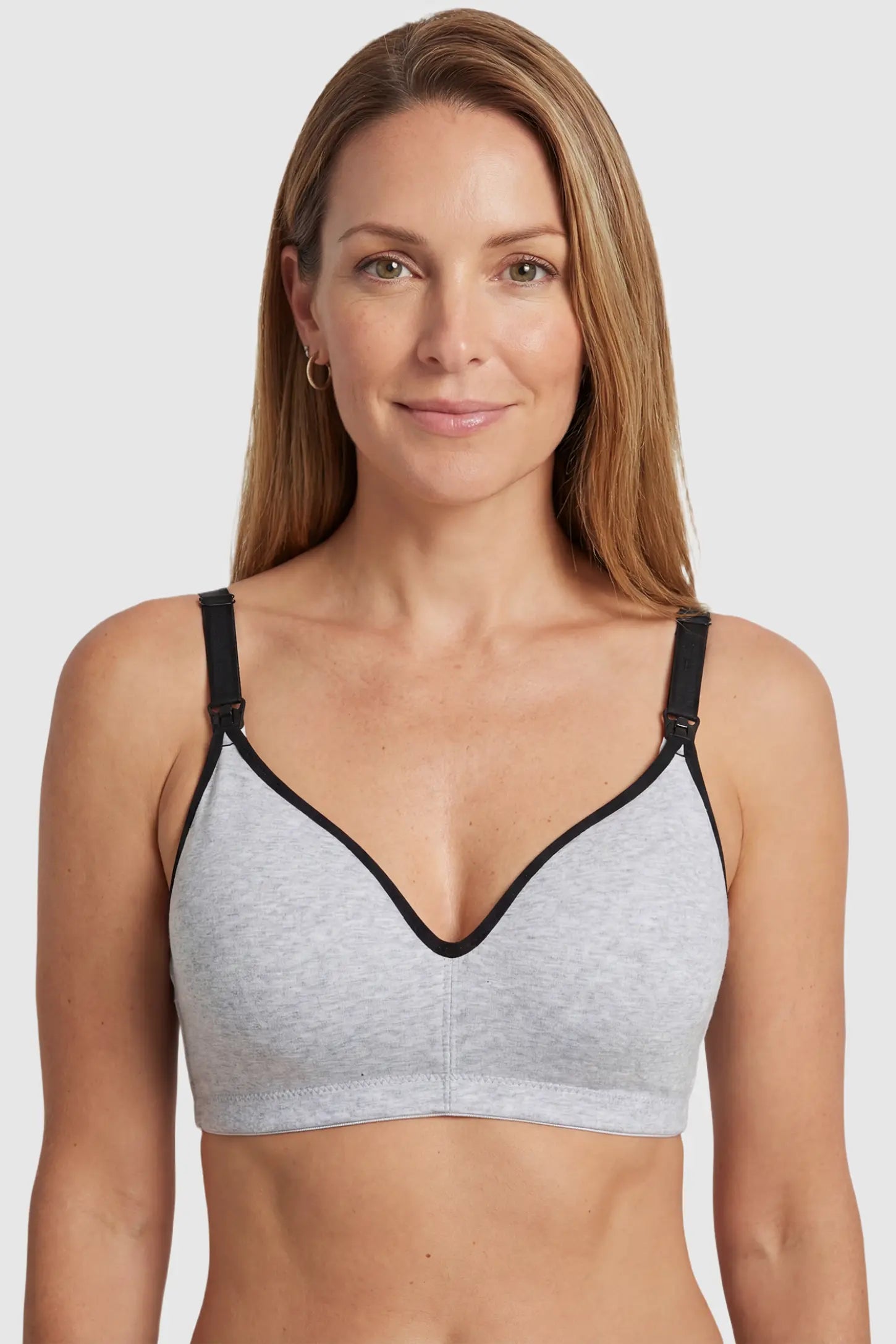 Clip-Down Seamless Nursing Bra Clip-Down Seamless Nursing Bra in gray featuring soft V-neck shape, and full-cup coverage on non pregnant model.