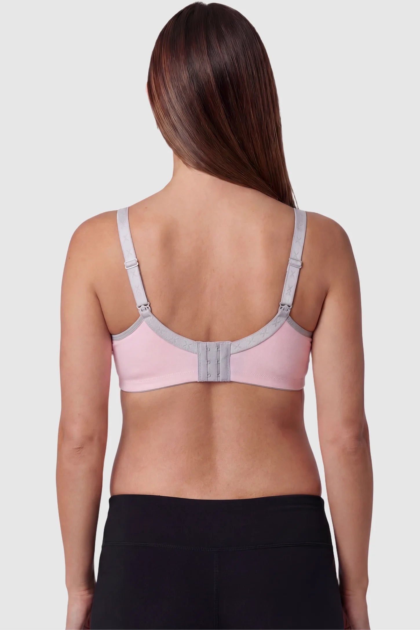 Clip-Down Seamless Nursing Bra Clip-Down Seamless Nursing Bra in pink featuring adjustable straps on pregnant model.