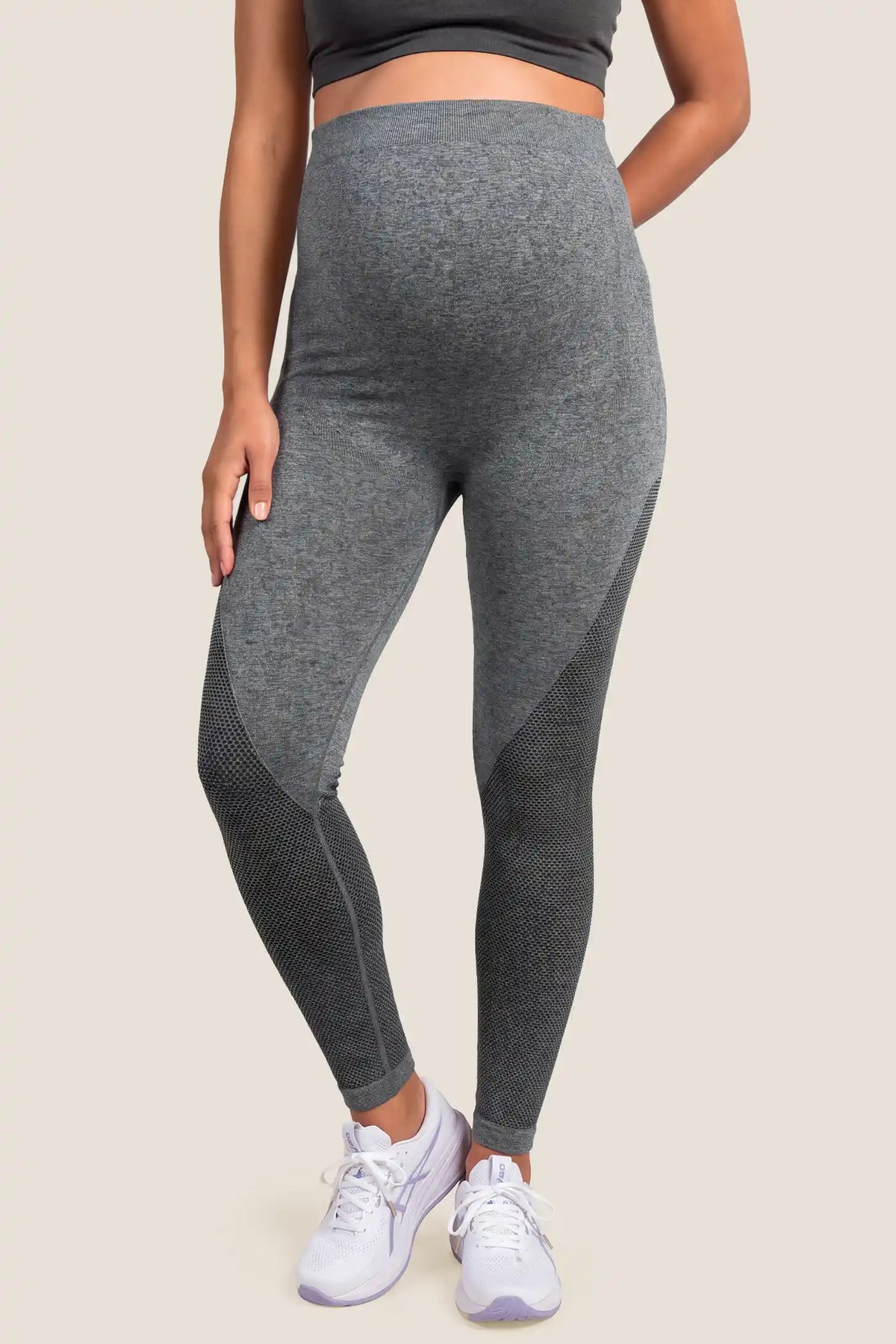 Seamless Over-the-Bump Maternity Leggings Seamless Over-the-Bump Maternity Leggings in Grey featuring 360° over-the-bump belly support, sculpting hip & thigh contour, and seamless anti-chafing comfort on a pregnant model, front view.