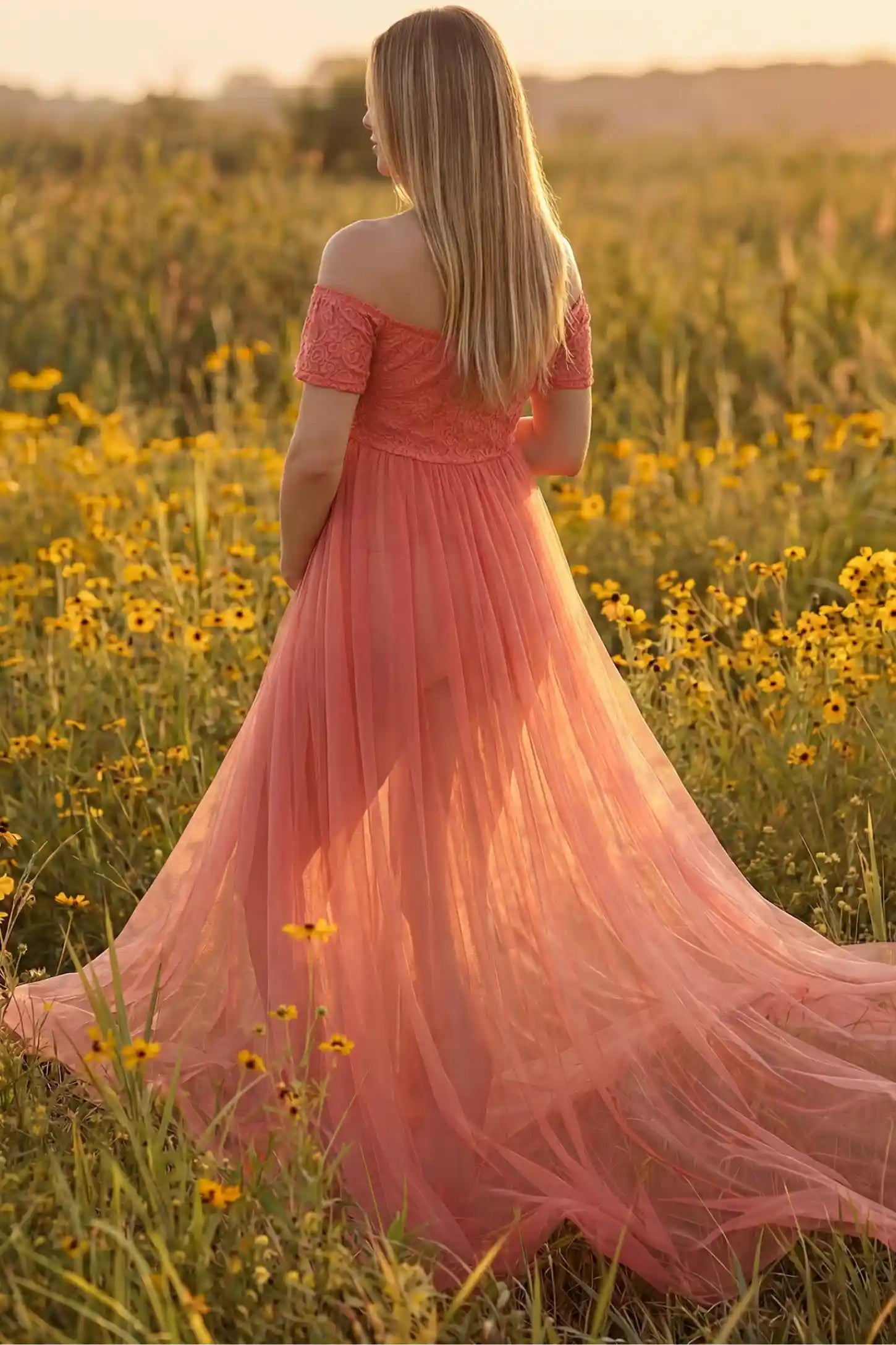 Lace Sheer Overlay Off-Shoulder Maternity Photoshoot Dress Lace Sheer Overlay Off Shoulder Maternity Photoshoot Gown in Rose featuring flowing sheer skirt on a back view pregnant model.