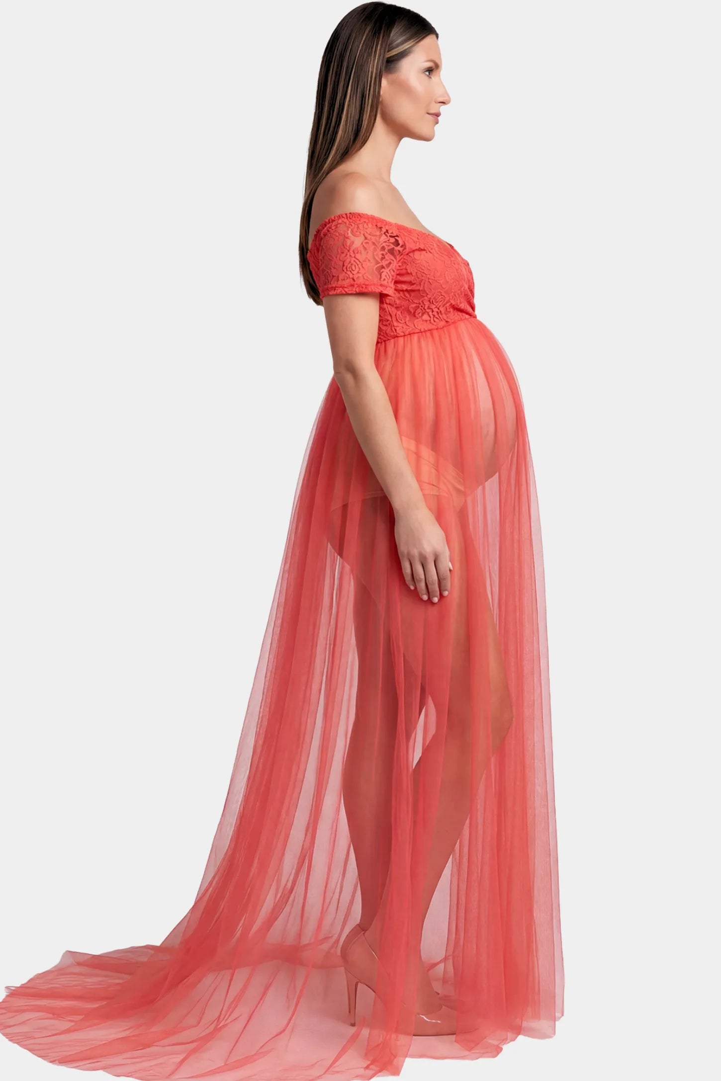 Lace Sheer Overlay Off Shoulder Maternity Photoshoot Gown in Rose featuring off shoulder design and flowing sheer skirt on a pregnant model.