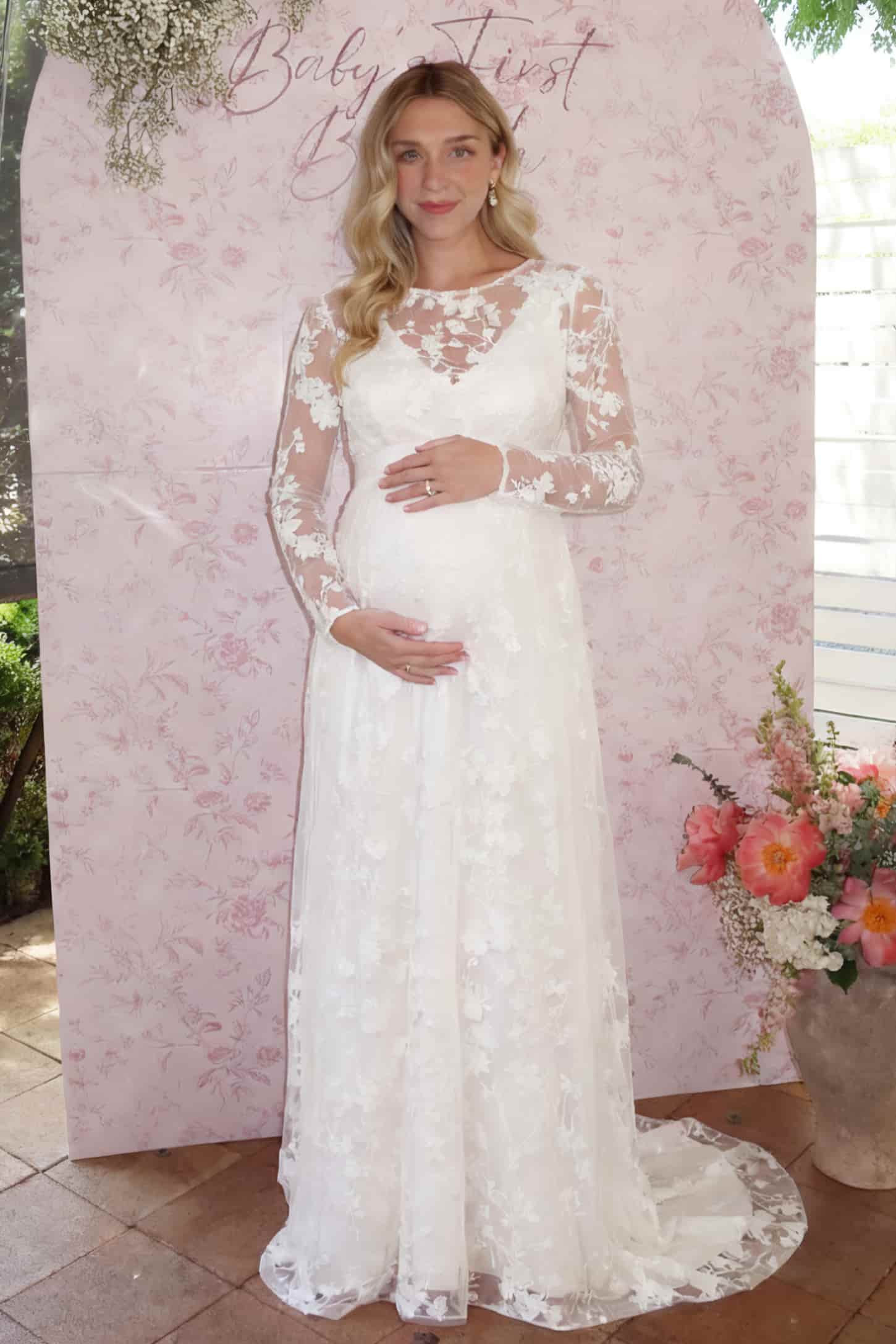 Lace Long Sheer Sleeve Bridal Maternity Gown Lace Long Sheer Sleeve Bridal Maternity Gown in white featuring illusion scoop neckline and sheer lace sleeves on a pregnant model.