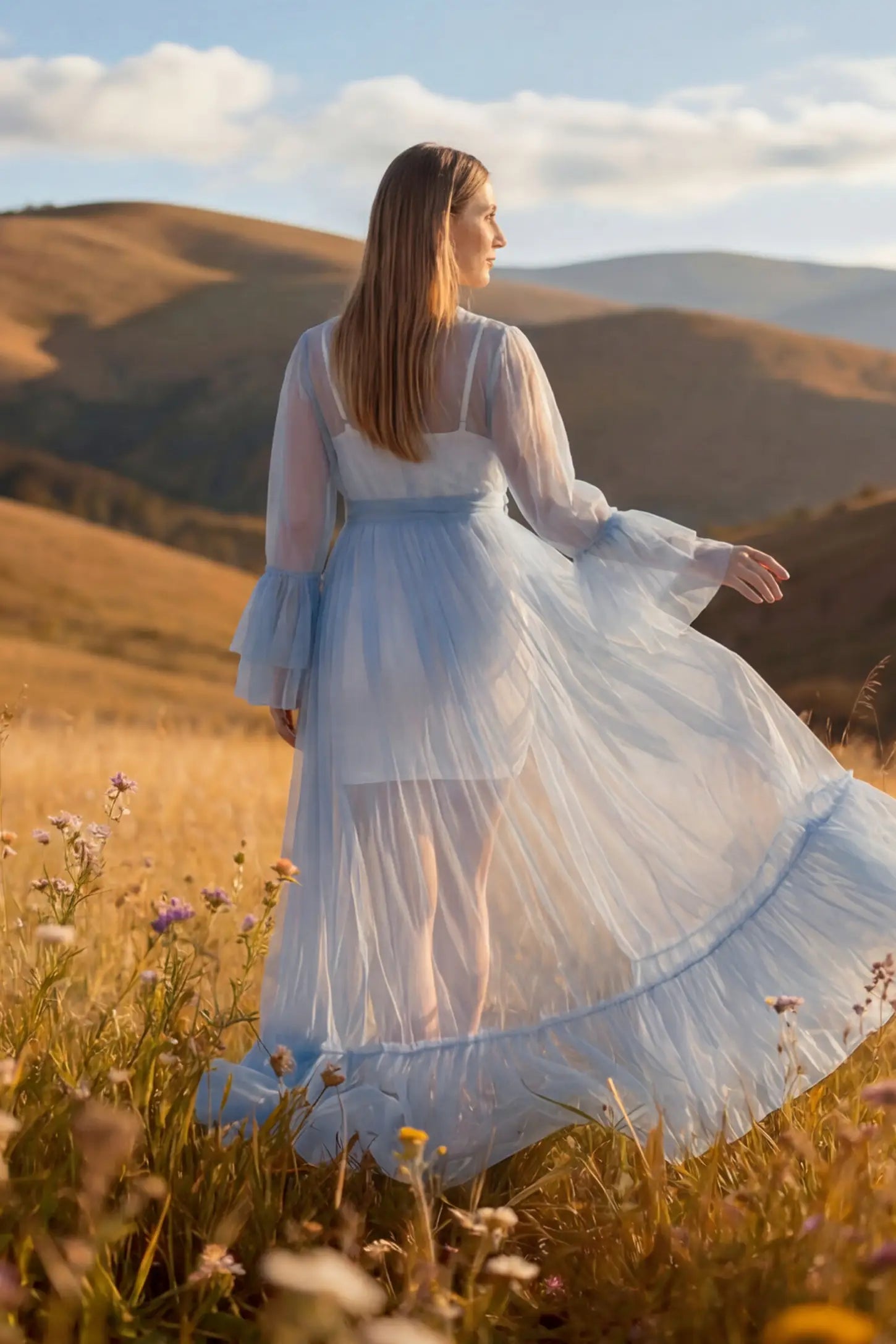 Sheer Tulle Deep V-Neck Tiered Maternity Maxi Gown Sheer tulle deep V-neck tiered maternity maxi gown in Blue with cascading sheer tulle layers, back view on pregnant model