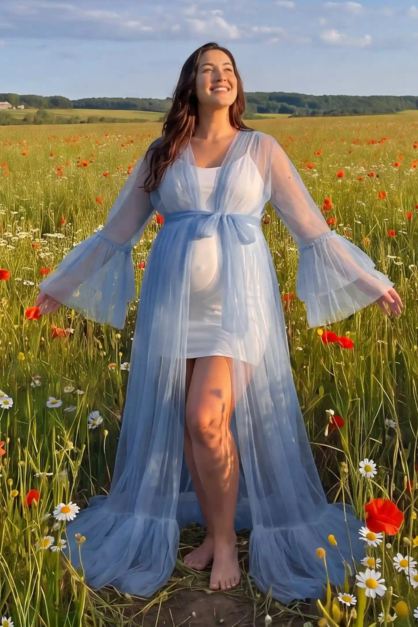 Sheer Tulle Deep V-Neck Tiered Maternity Maxi Gown Sheer tulle deep V-neck tiered maternity maxi gown in Blue with dramatic ethereal silhouette, side view on plus-size model