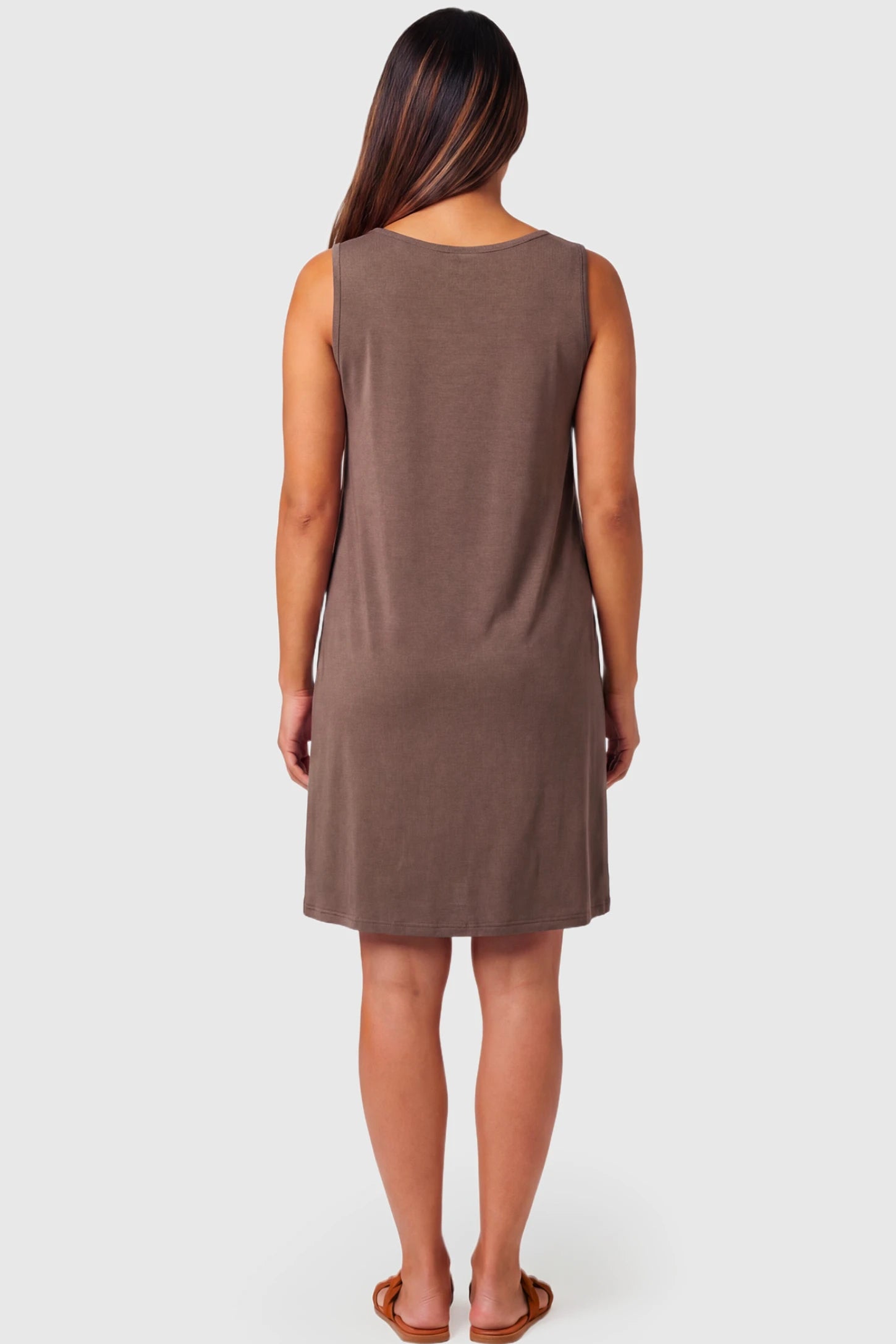 Sleeveless Shift Maternity & Nursing Short Dress Sleeveless Shift Maternity & Nursing Short Dress in brown featuring a relaxed shift silhouette on a pregnant model.