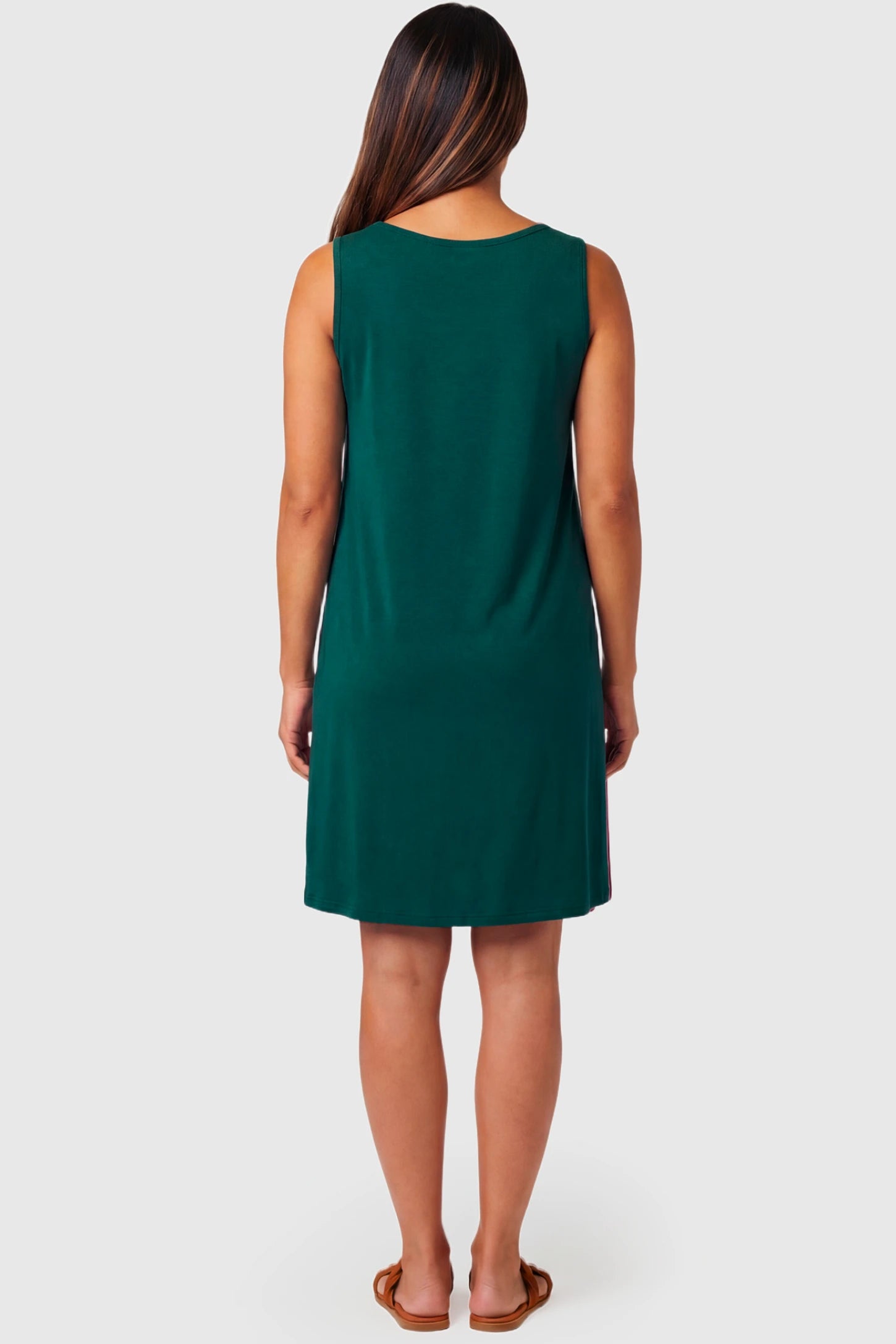 Sleeveless Shift Maternity & Nursing Short Dress Sleeveless Shift Maternity & Nursing Short Dress in green featuring a relaxed shift silhouette on a pregnant model.