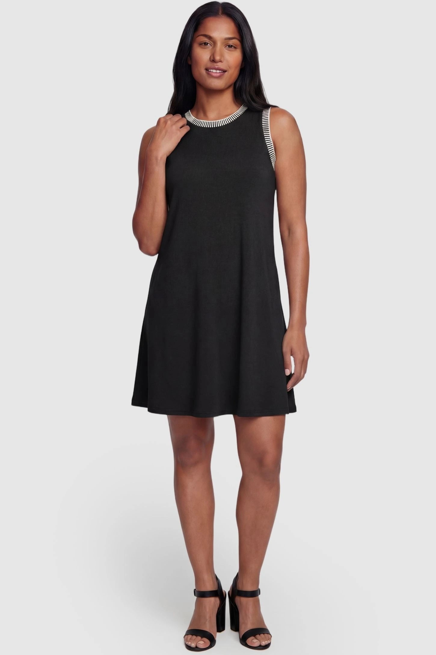 Sleeveless Round Neck A-Line Short Maternity Dress Sleeveless round neck A-line short maternity dress in black featuring casual summer-ready silhouette in full body view on a postpartum model