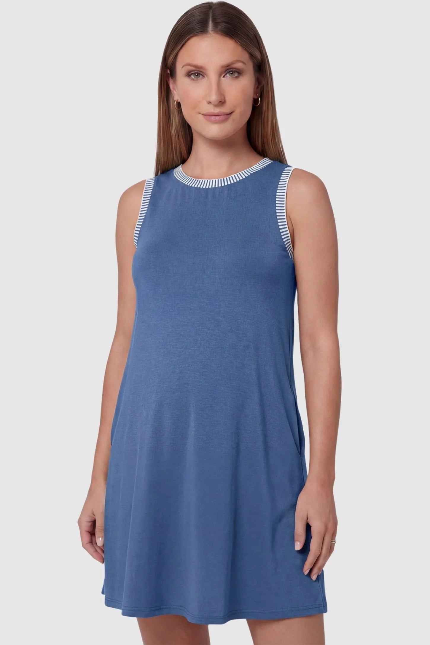 Sleeveless Round Neck A-Line Short Maternity Dress Sleeveless round neck A-line short maternity dress in royal blue featuring sleeveless and flattering A-line cut in front view on a pregnant model