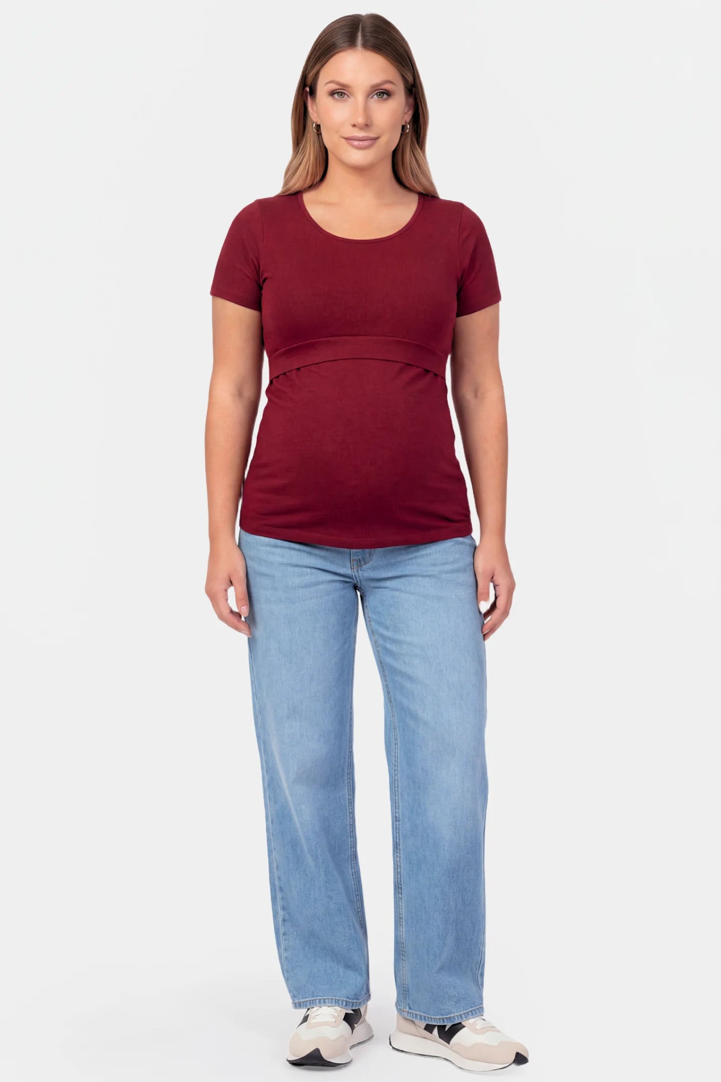 Basic Crew Neck Maternity & Nursing T-Shirt Basic Crew Neck Maternity & Nursing T-Shirt in burgundy featuring a stretch-fit round neck design on a pregnant model.