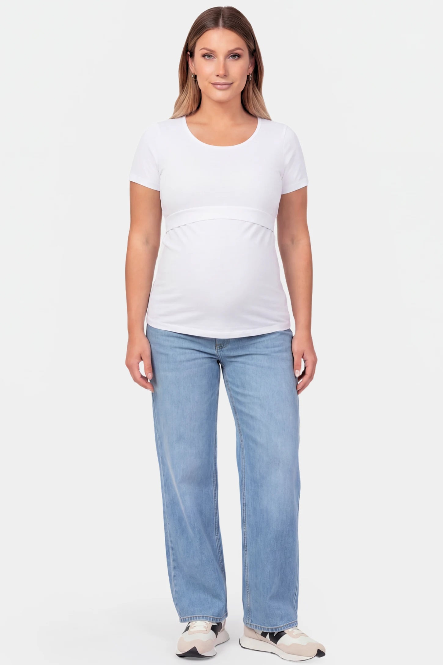 Basic Crew Neck Maternity & Nursing T-Shirt Basic Crew Neck Maternity & Nursing T-Shirt in White featuring a stretch-fit round neck design on a pregnant model.