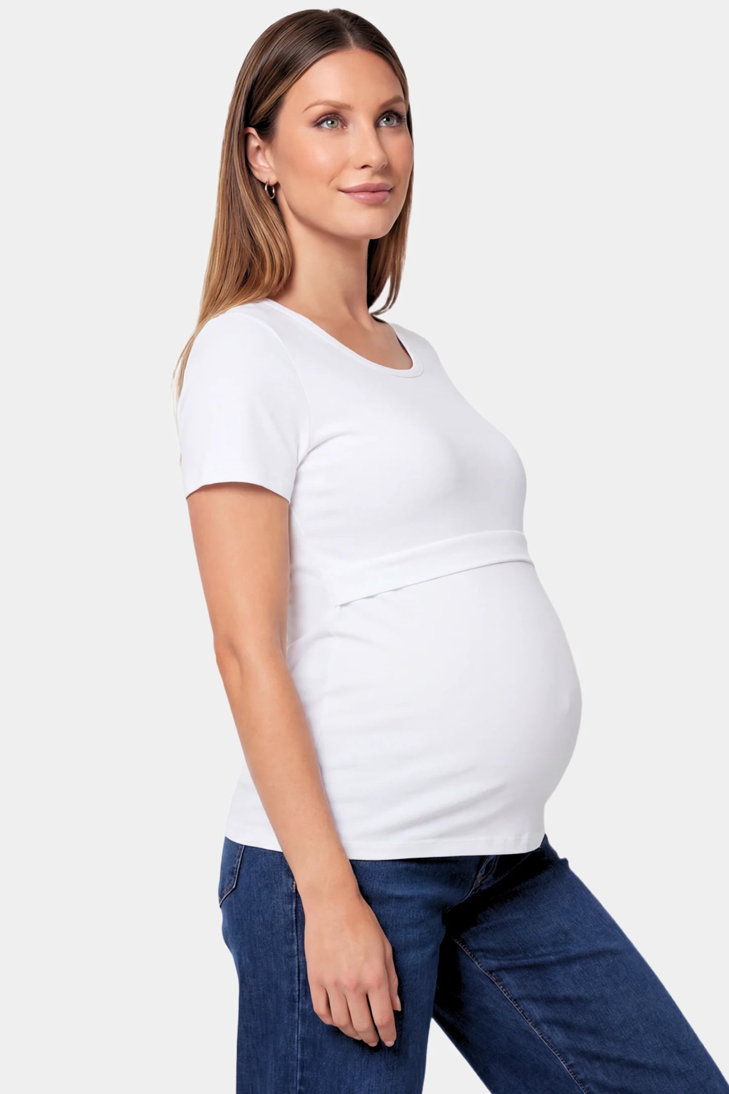 Basic Crew Neck Maternity & Nursing T-Shirt Basic Crew Neck Maternity & Nursing T-Shirt in White featuring a stretch-fit round neck design on a pregnant model.