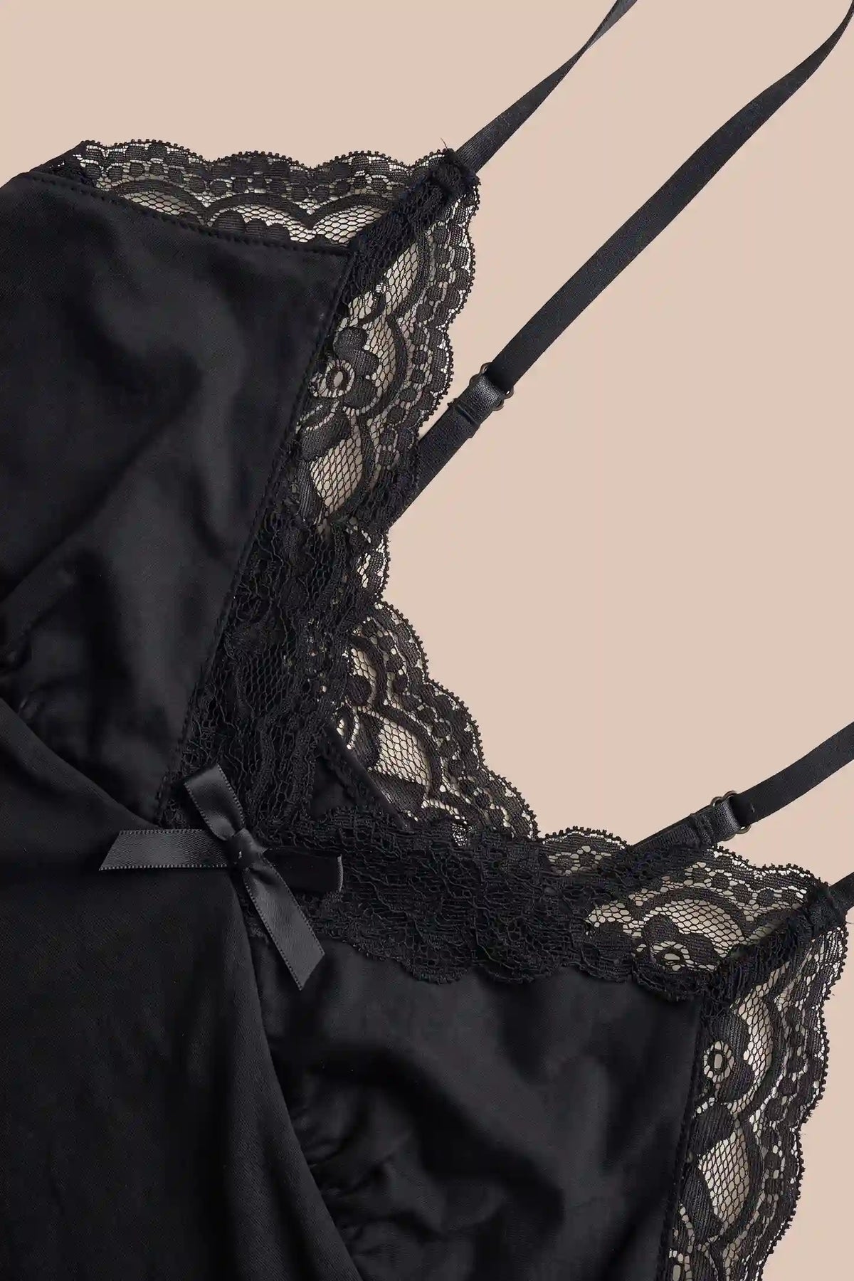 Side Slit Lace Maternity Babydoll Nightdress Side Slit Lace Maternity Babydoll Nightdress in Black featuring a close-up detail view of the intricate lace trim, front ribbon bow accent, and adjustable shoulder straps.