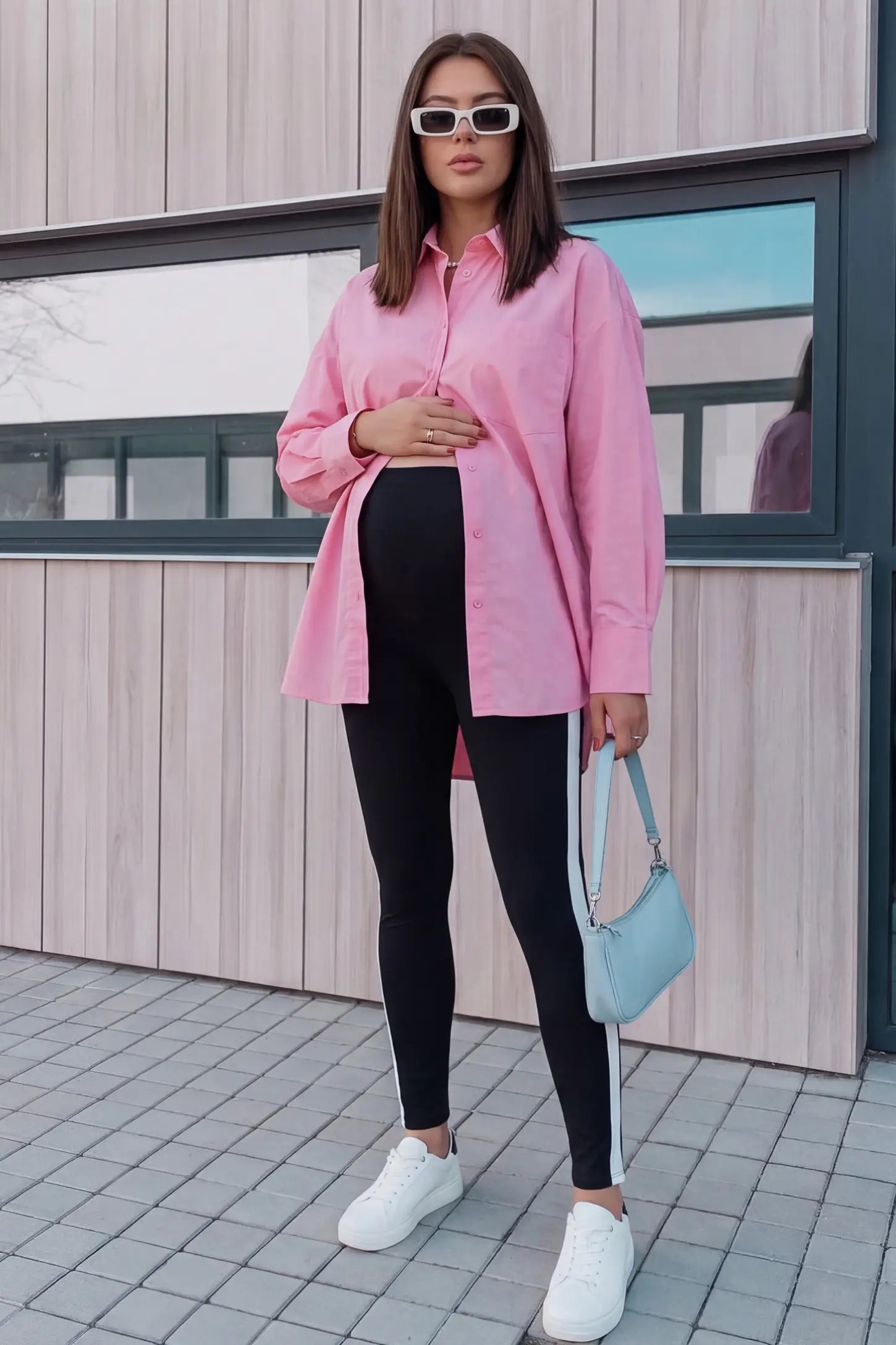 Stretch Waist Panel Side-Stripe Maternity Leggings Stretch waist panel side-stripe maternity leggings in black with sleek sporty fit, full body front view on pregnant model