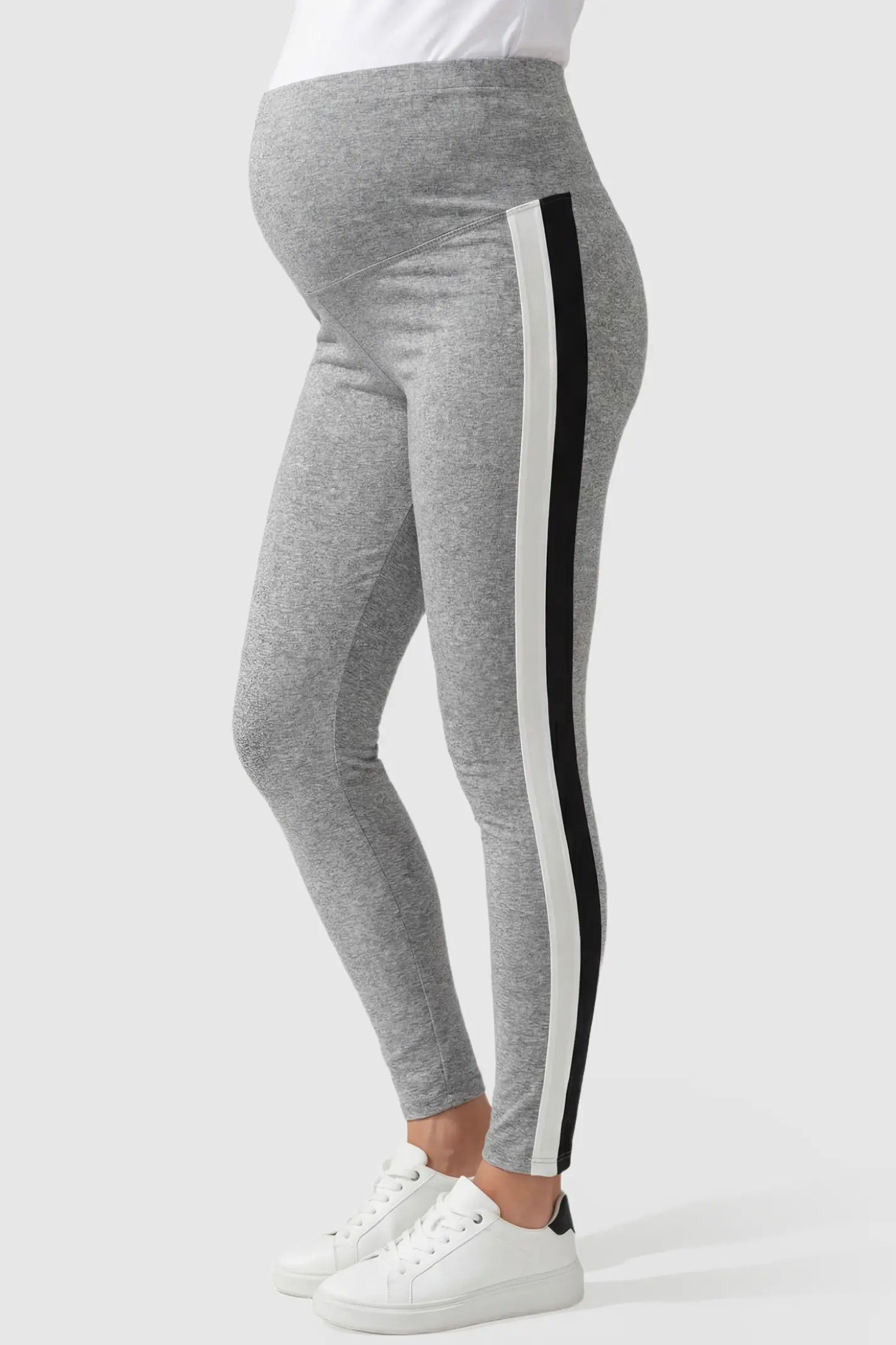 Stretch Waist Panel Side-Stripe Maternity Leggings Stretch waist panel side-stripe maternity leggings in gray with bold side stripe detail, side view on pregnant model