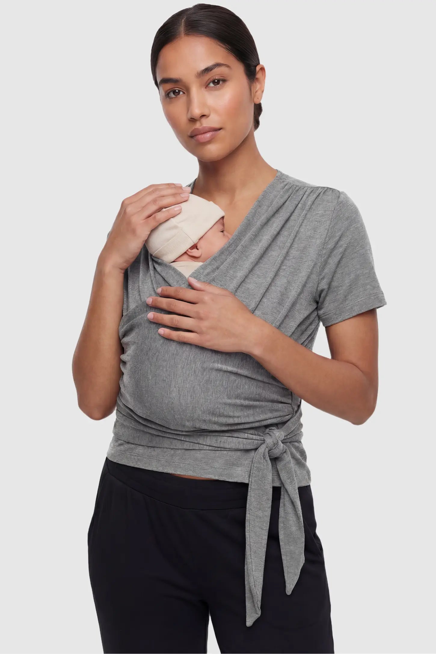 3 in 1 Skin to Skin Wrap Nursing Top Skin to Skin Wrap Nursing Top in gray featuring soft wrap-front design and short sleeves on non pregnant model.