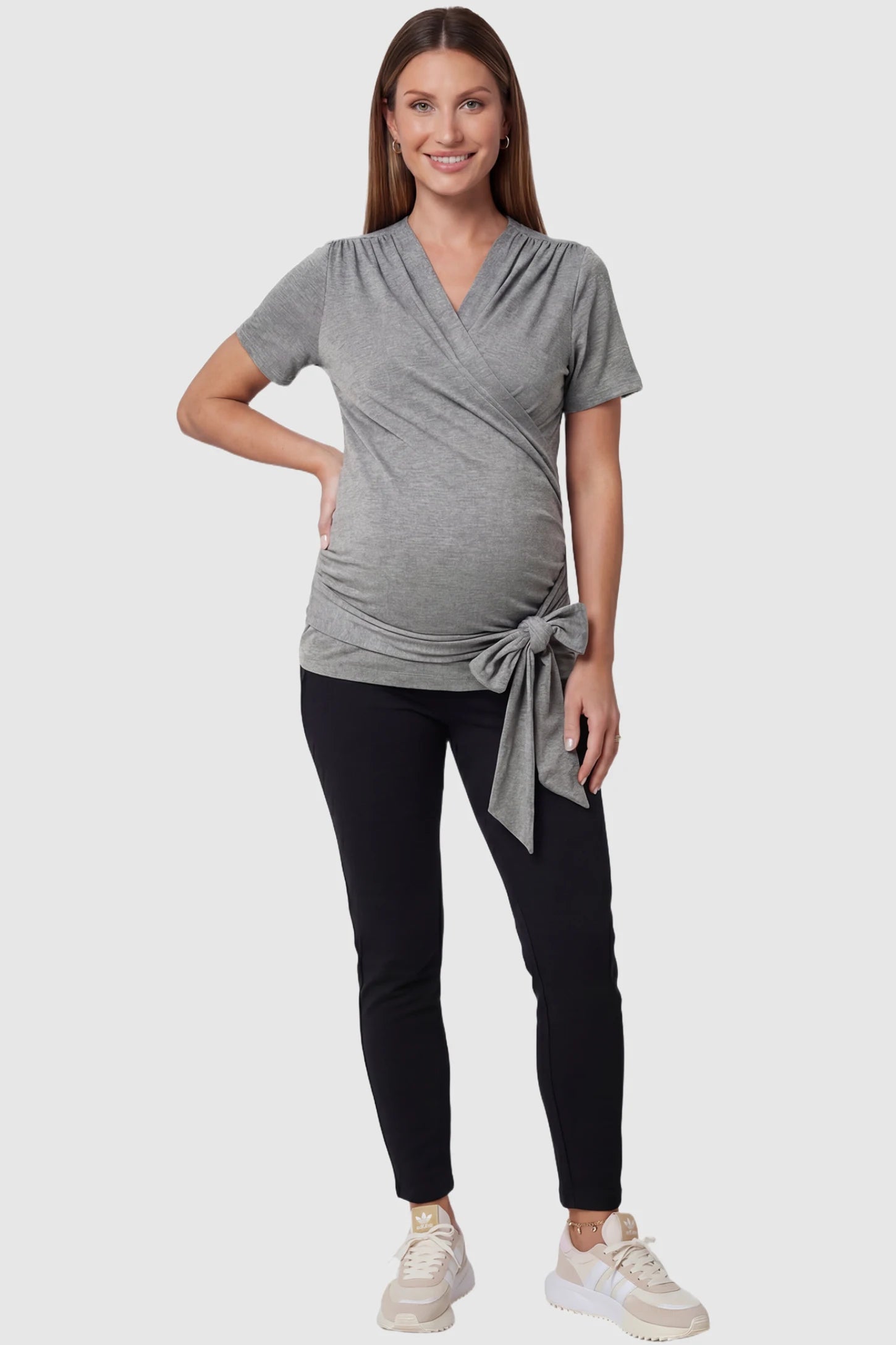 3 in 1 Skin to Skin Wrap Nursing Top Skin to Skin Wrap Nursing Top in gray featuring soft wrap-front design and short sleeves on pregnant model.