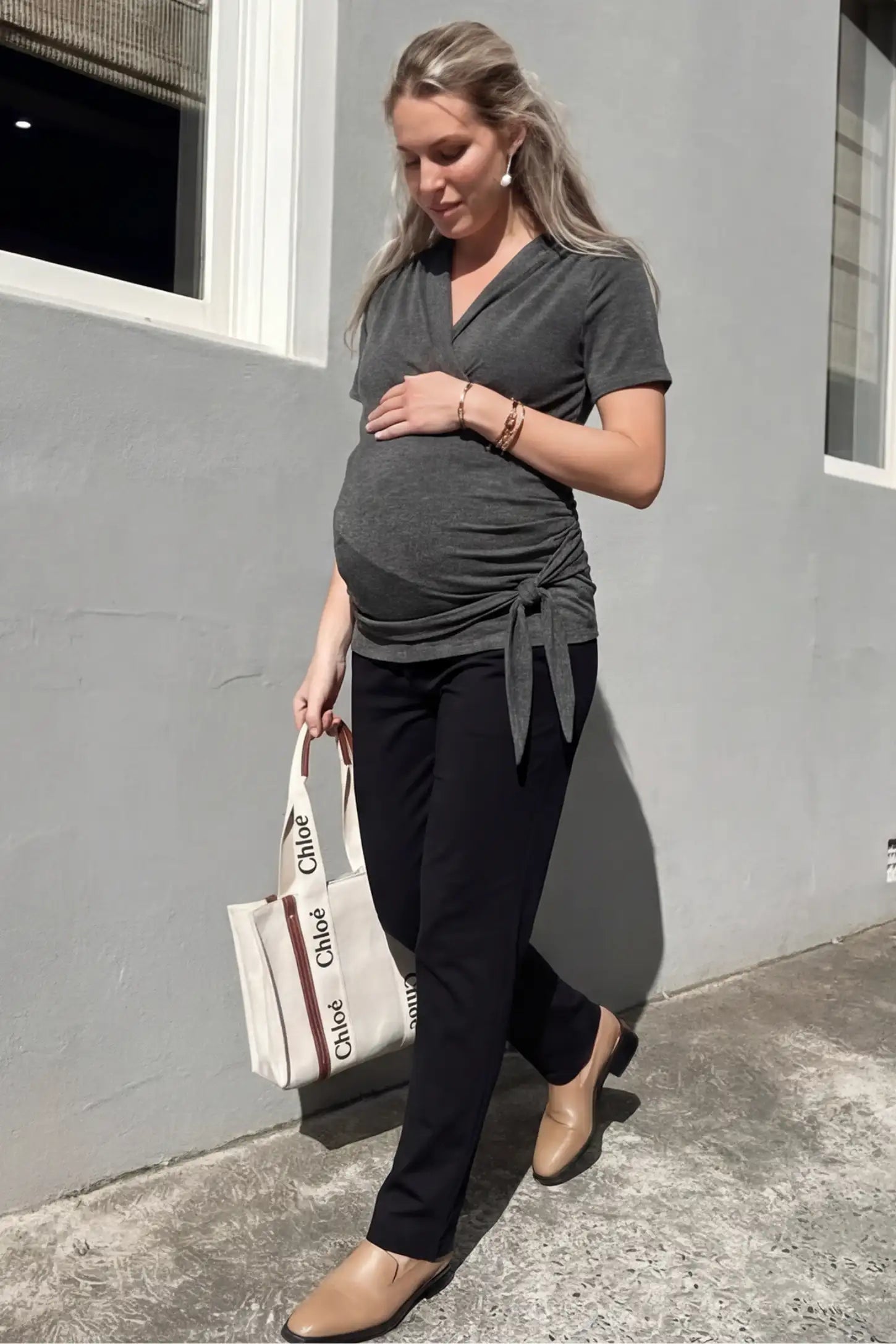 3 in 1 Skin to Skin Wrap Nursing Top Skin to Skin Wrap Nursing Top in gray featuring soft wrap-front design and short sleeves on pregnant model.
