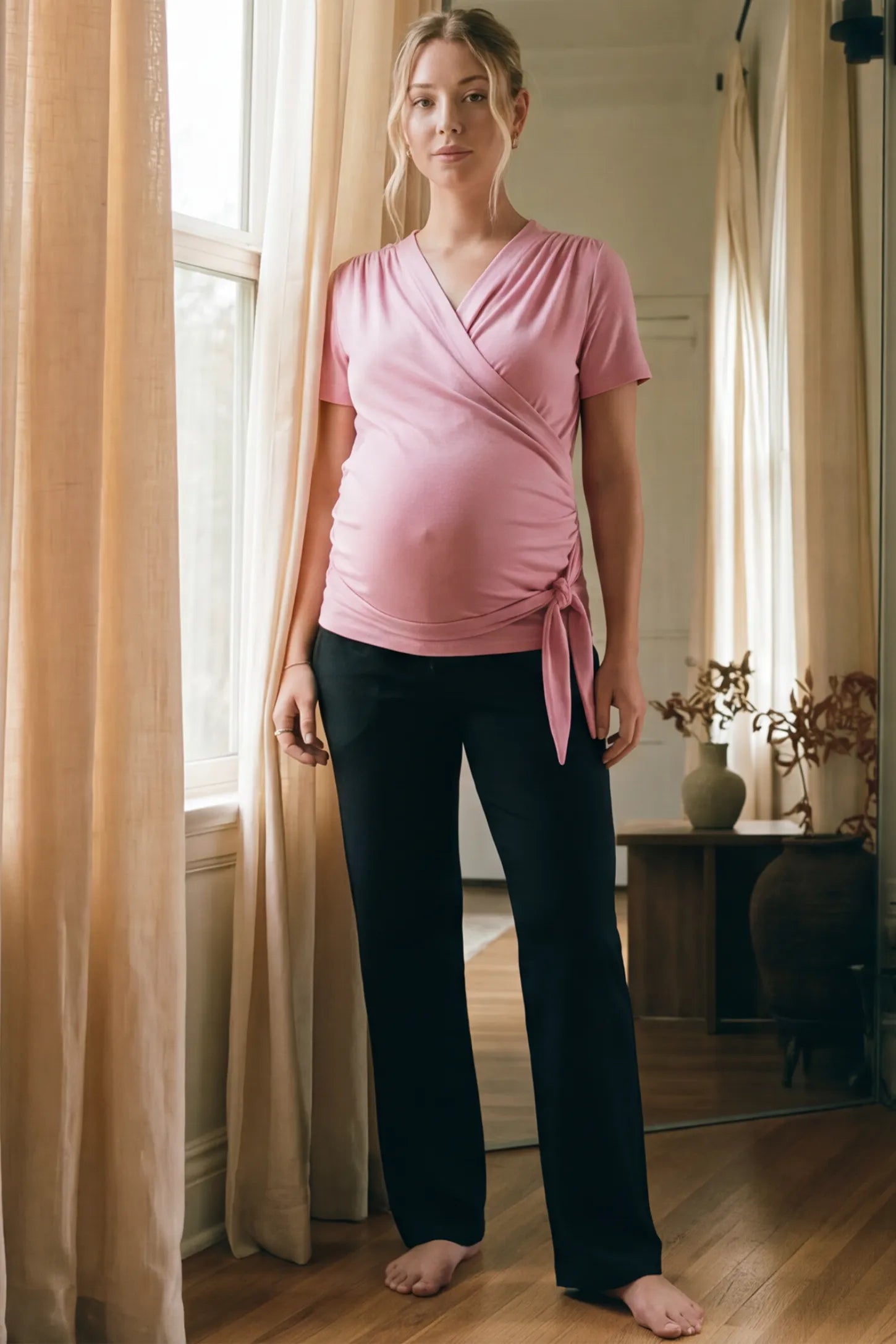 3 in 1 Skin to Skin Wrap Nursing Top Skin to Skin Wrap Nursing Top in pink featuring soft wrap-front design and short sleeves on pregnant model.