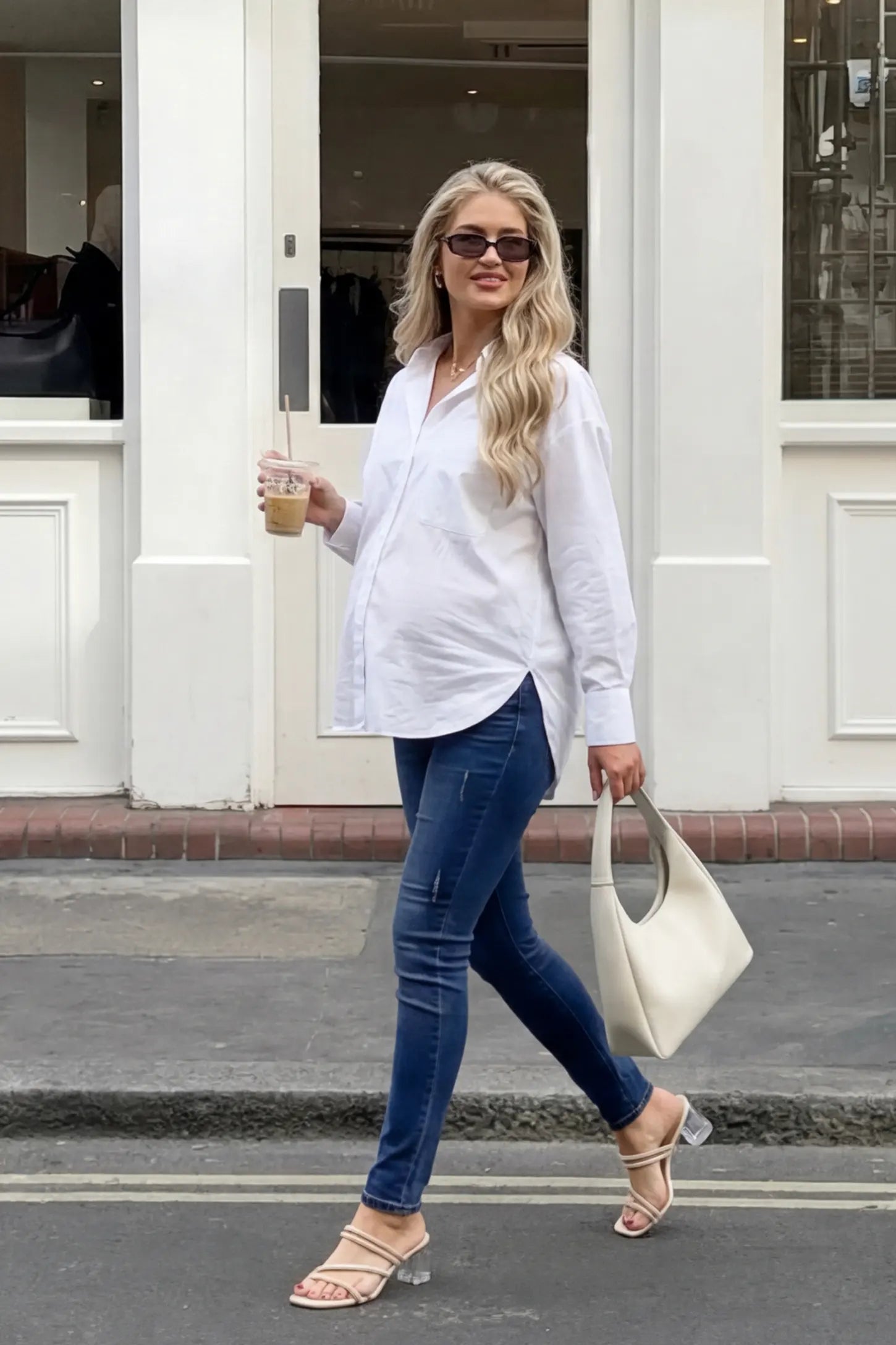 Cuffed Hem Skinny Maternity Jeans Cuffed Hem Skinny Maternity Jeans in dark blue featuring full belly panel and ankle-length cuffed hem on front  view pregnant model.