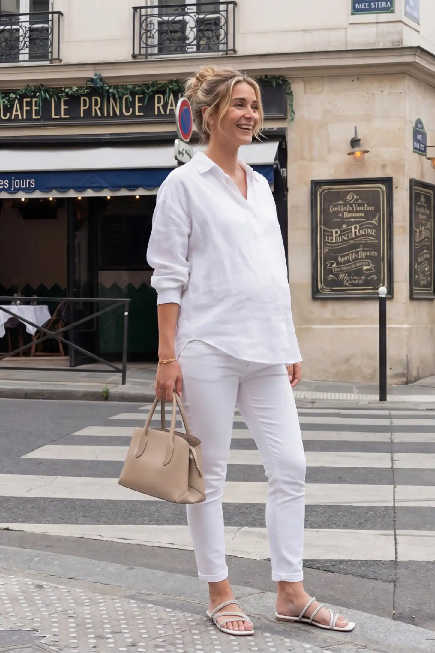 Cuffed Hem Skinny Maternity Jeans Cuffed Hem Skinny Maternity Jeans in White featuring full belly panel and ankle-length cuffed hem on side view pregnant model.