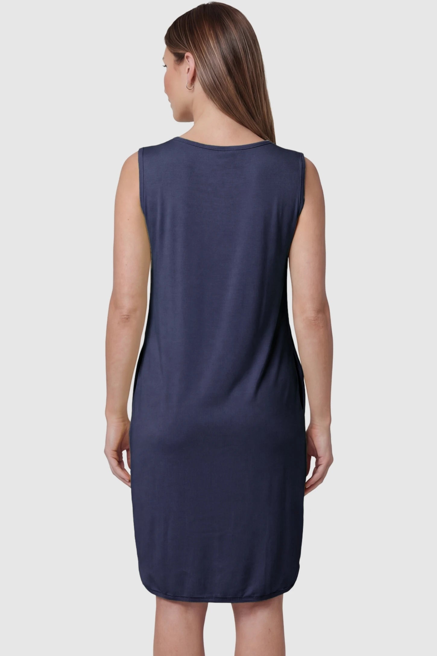 Sleeveless High-Waisted Midi Maternity & Nursing Dress Sleeveless high-waisted midi maternity and nursing dress in dark blue featuring clean sleeveless back design in back view on a pregnant model