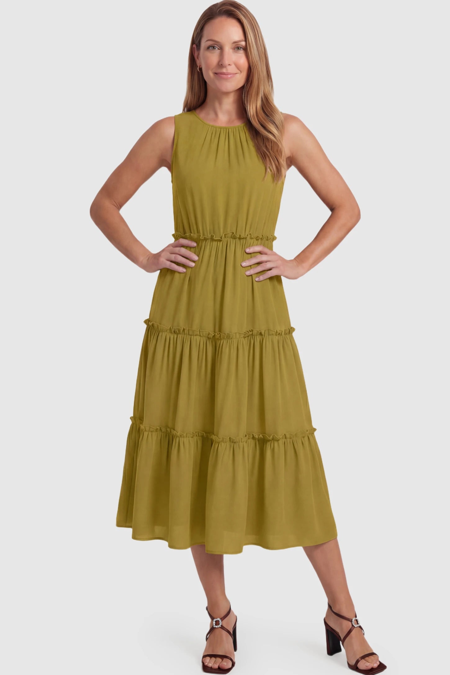 Solid Sleeveless Ruffle Tiered Maternity Midi Dress Solid Sleeveless Ruffle Tiered Maternity Midi Dress in olive green featuring a ruffle tiered skirt on a postpartum model.