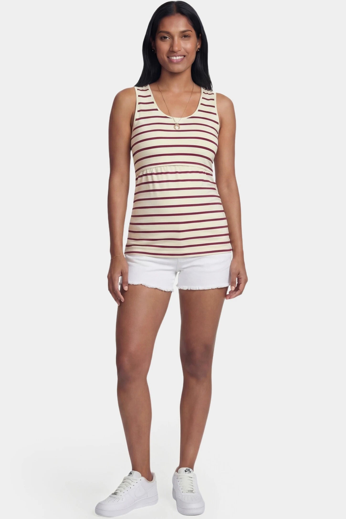 Concealed Nursing Opening Sleeveless Maternity & Nursing Top Concealed Nursing Opening Sleeveless Maternity & Nursing Top in Red and White Stripes featuring a sleeveless cut shown in full body view on a postpartum model.