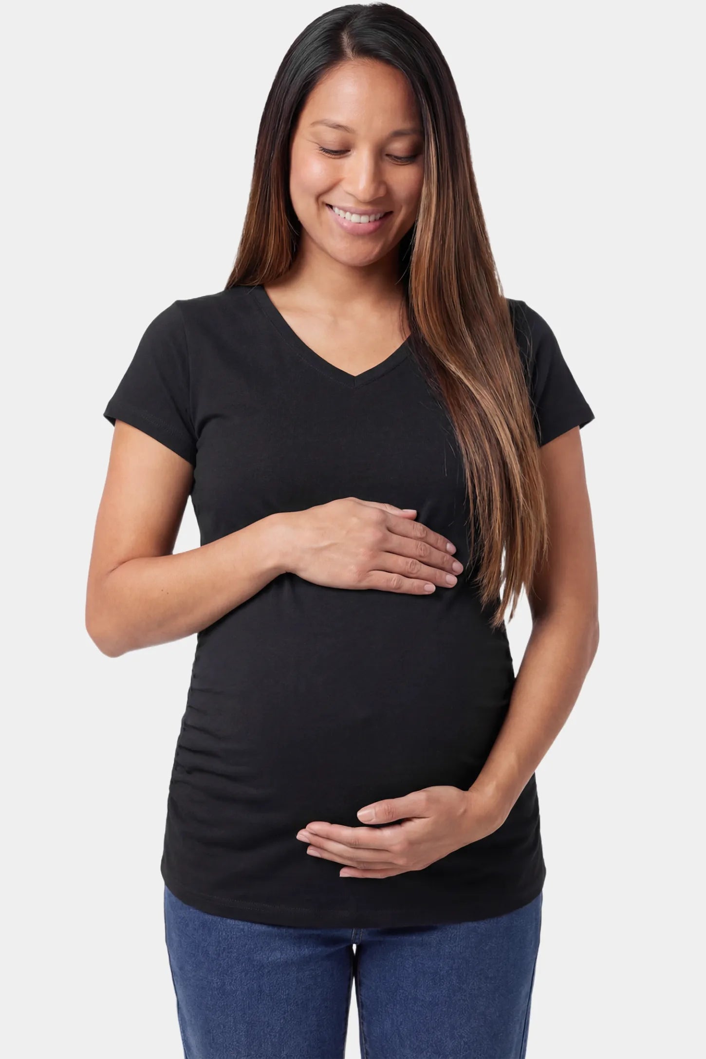 Slim Fit V-Neck Short Sleeve Maternity Top Slim fit V-neck short sleeve maternity top in black featuring soft stretch fabric in front view on a pregnant model