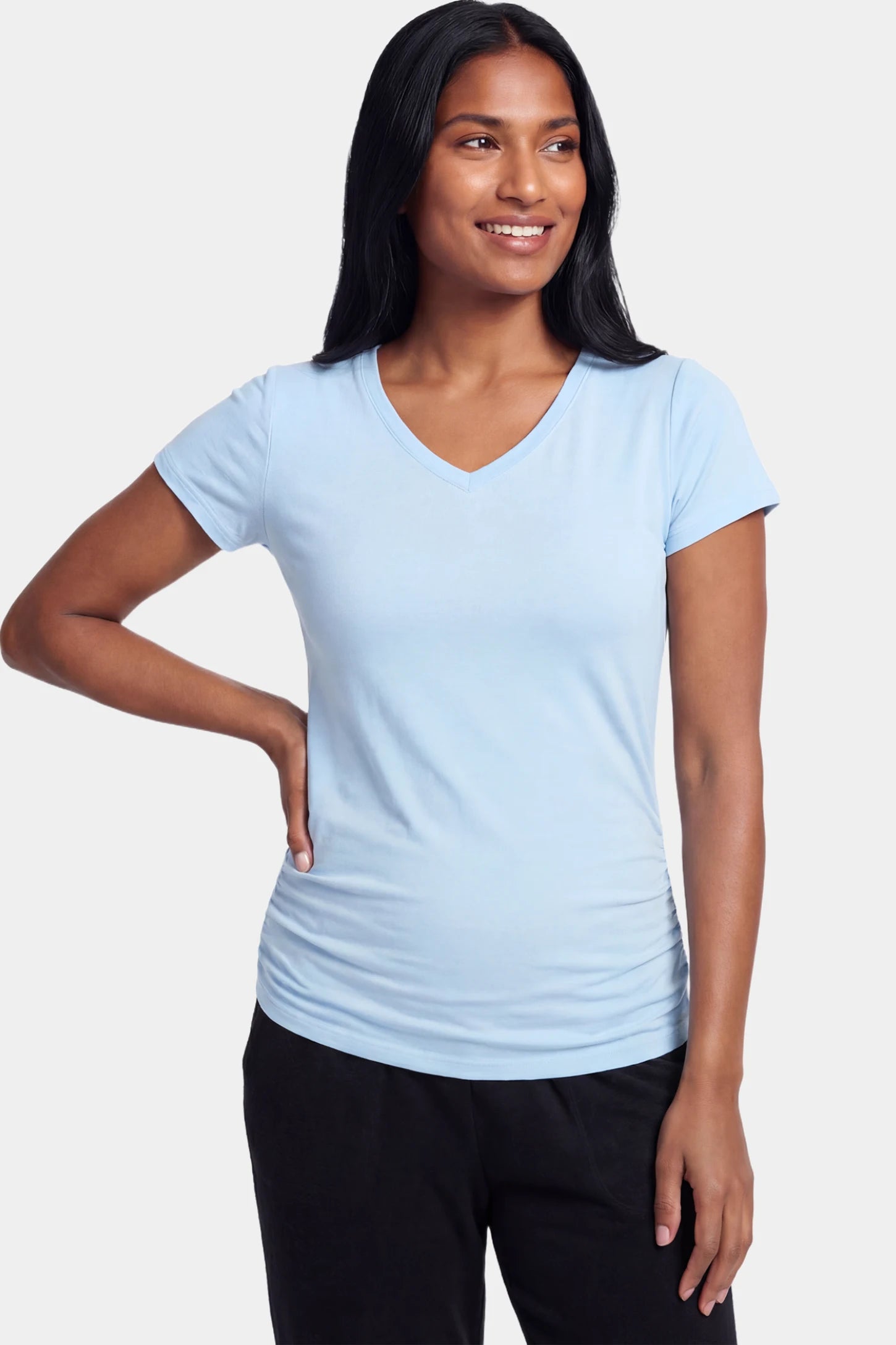 Slim Fit V-Neck Short Sleeve Maternity Top Slim fit V-neck short sleeve maternity top in light blue featuring soft stretch fabric in front view on a postpartum model