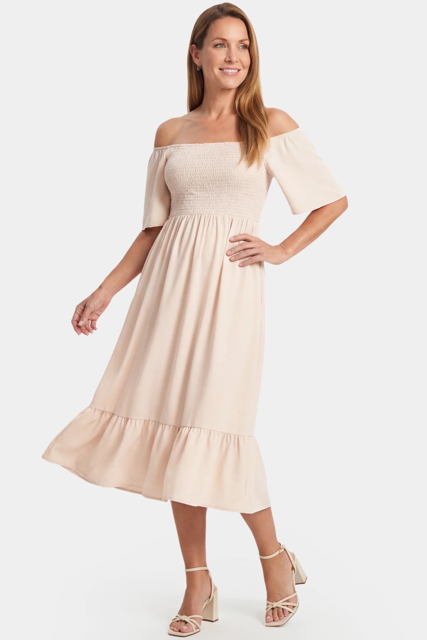 Off-Shoulder Smocked Short Sleeve A-Line Midi Maternity Dress Off-shoulder smocked short sleeve A-line midi maternity dress in apricot featuring smocked elastic waist and short sleeve in front view on a postpartum model